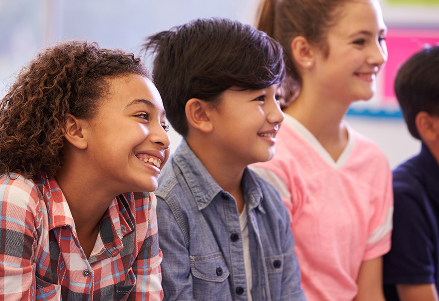 Three students in a classroom