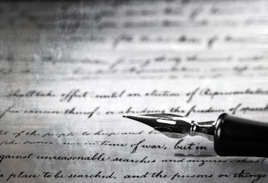vintage pen on a handwritten paper