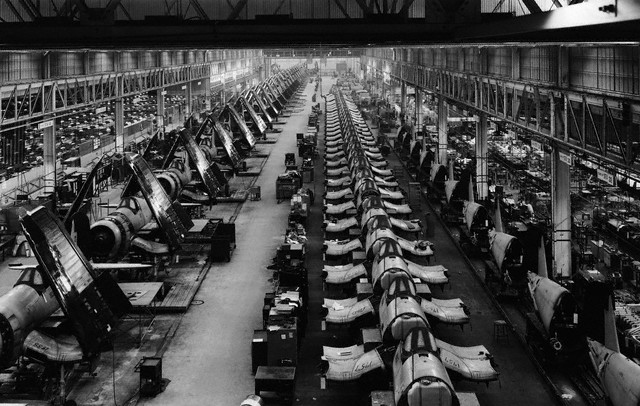 ca. 1939-1945, Stratford, Connecticut, USA --- Airplane factory in Stratford, Connecticut, World War II, which produced over 6,000 Corsairs- fighter planes with fold-up wings for use on board aircraft carriers. --- Image by © Bettmann/CORBIS