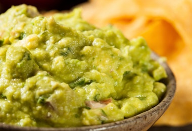 Green Homemade Guacamole with Tortilla Chips