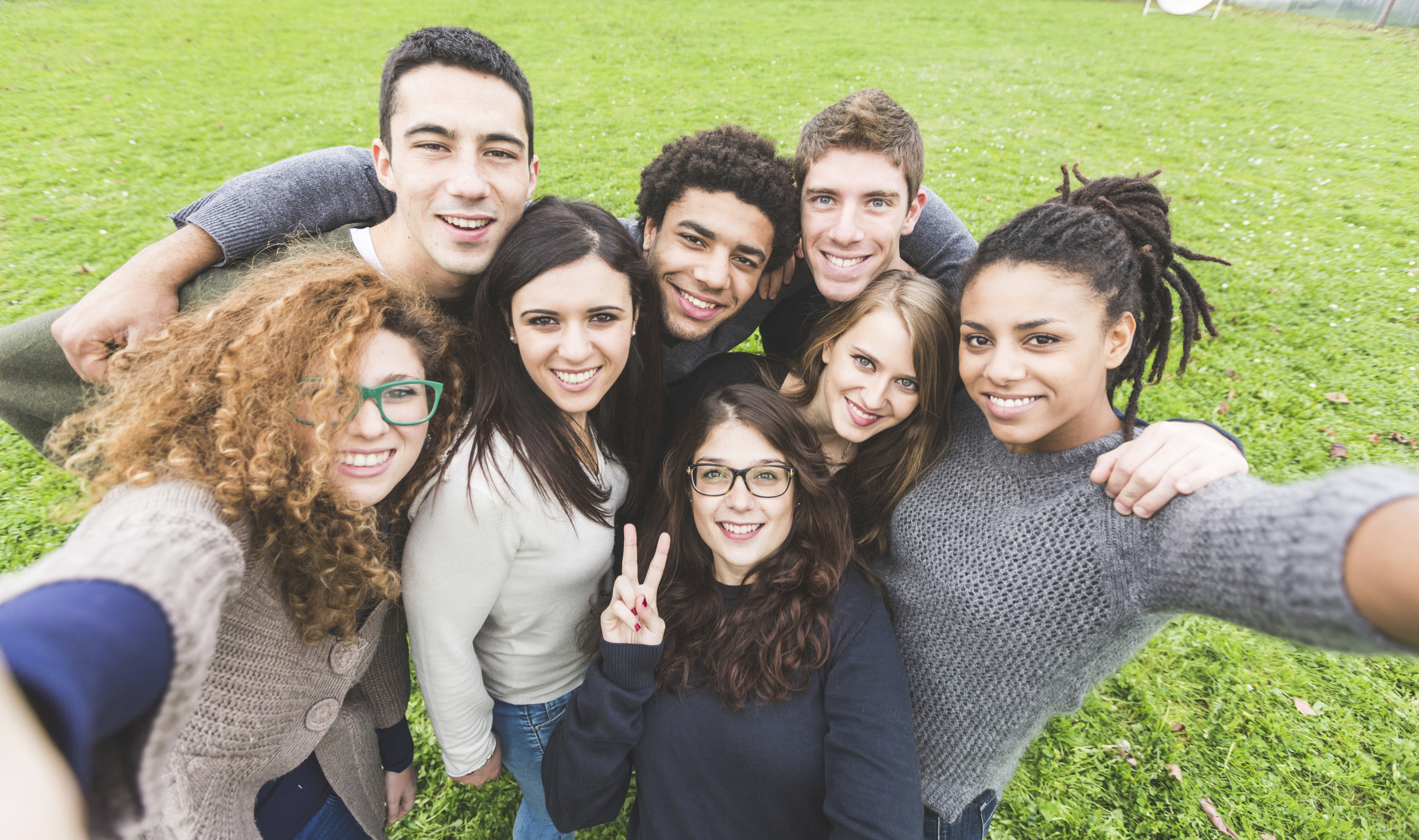 Multiethnic Group of Friends Taking Selfie at Park