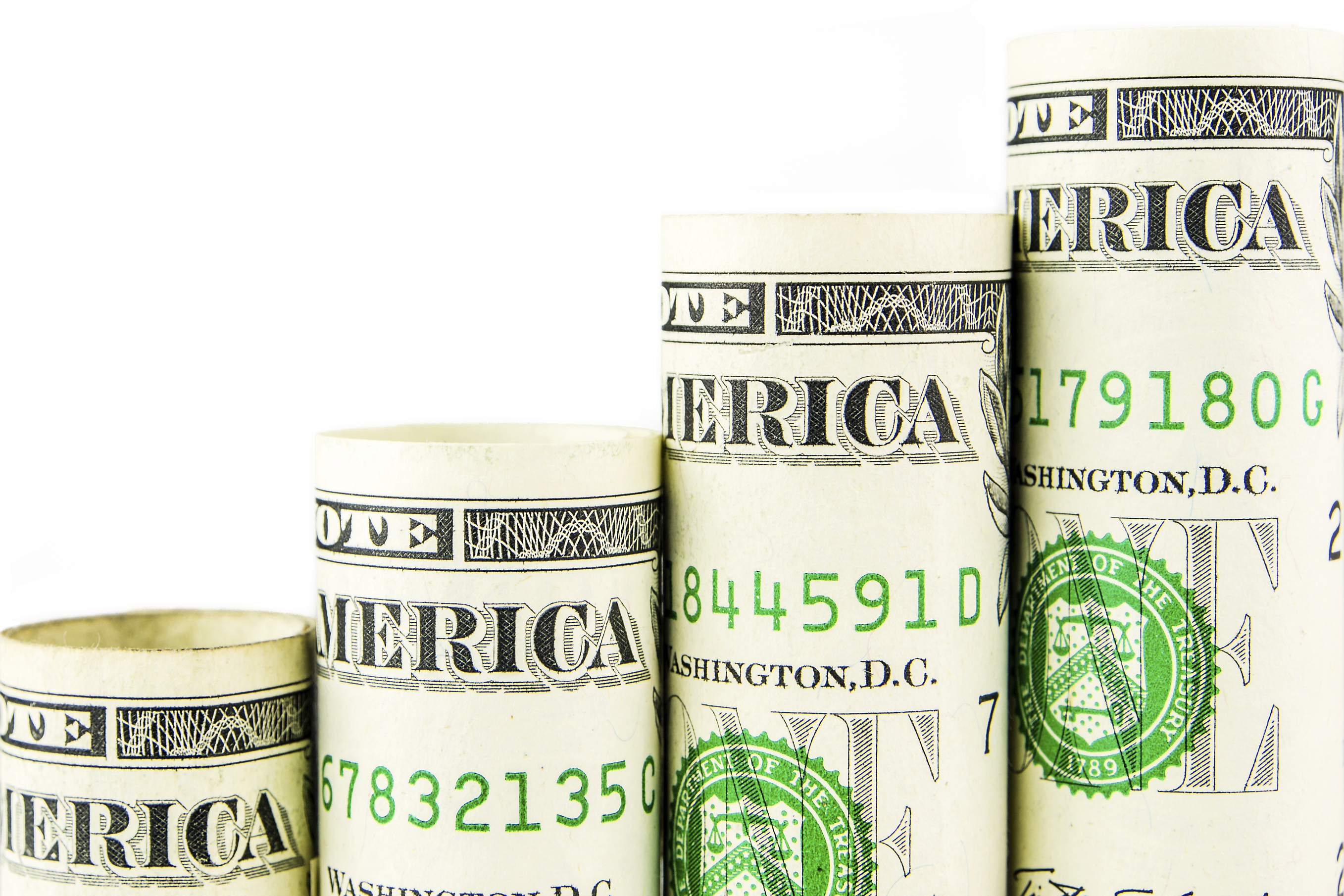 rising steps made of one american dollar banknotes on white bakground