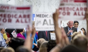 Sen. Bernie Sanders, I-Vt., right, speaks at a news conference on Capitol Hill in Washington, Wednesday, Sept. 13, 2017, to unveil Medicare for All legislation to reform health care. (AP Photo/Andrew Harnik)
