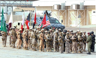 Soldiers from the United States, Kuwait, and other Gulf Cooperation Council (GCC) countries participate in the concluding drill of the wide-scale Eagle Resolve 2017 military exercise at Shuwaikh Port, west of Kuwait City on April 6, 2017.
About 1,000 US military personnel supported the month-long exercise which included a series of tactical demonstrations of land, maritime and air forces from several nations. / AFP PHOTO / Yasser Al-Zayyat        (Photo credit should read YASSER AL-ZAYYAT/AFP/Getty Images)