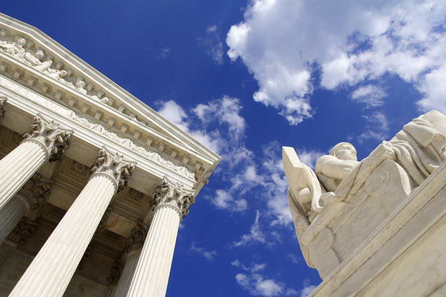 Authority of Law statue in front of the United States Supreme Court in Washington, D.C.