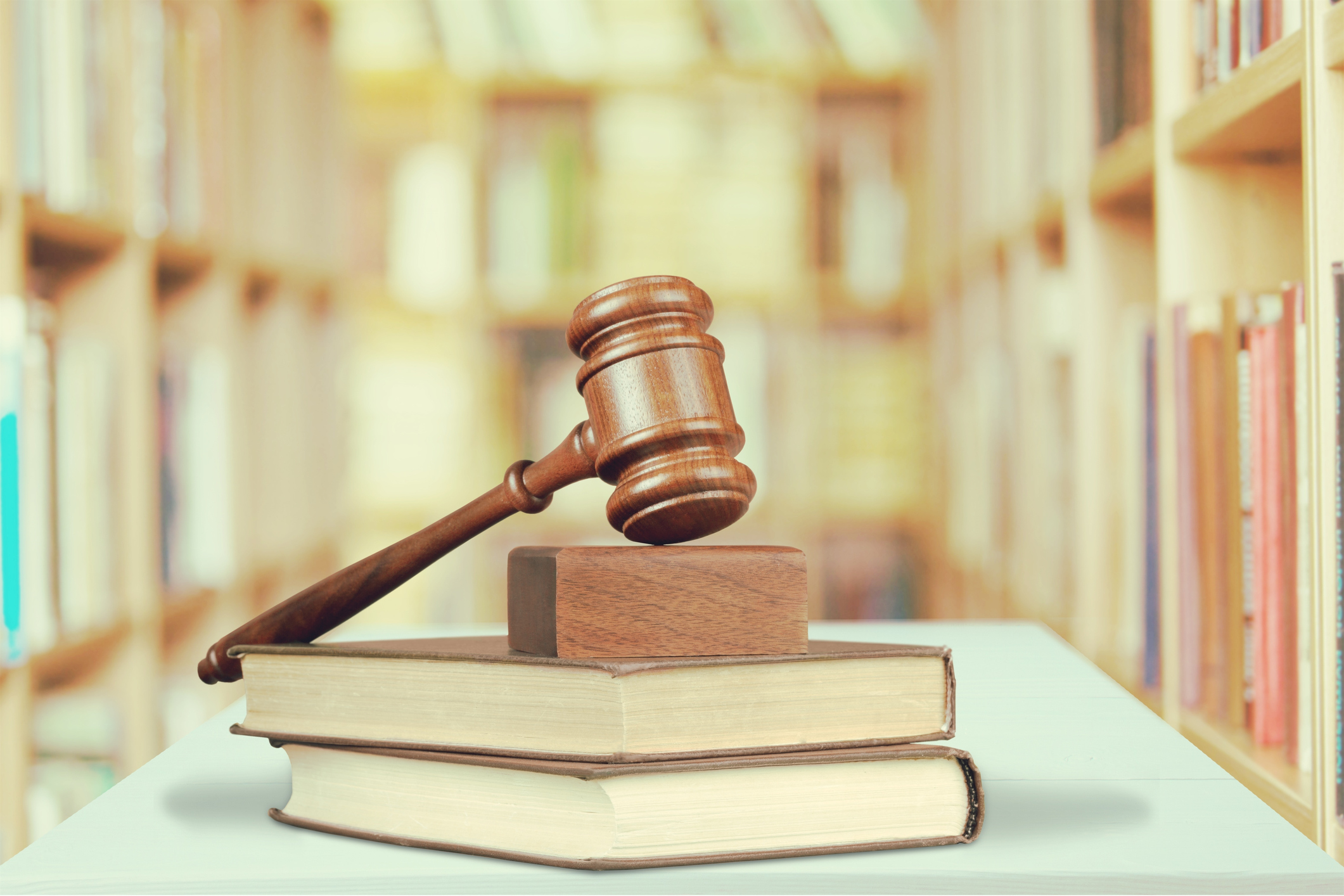 Books and wooden gavel, justice concept