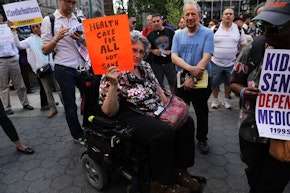 NEW YORK, NY - JUNE 28:  Jean Ryan from Disabled in Action joins others in protesting against the Senate healthcare bill on June 28, 2017 in New York City. The vote on the bill, which would make drastic cuts in medicaid among other changes, was postponed on Tuesday as Republican leadership seek to persuade fellow Republicans to vote for the plan. Currently, nine senators have said they will not support the bill, and the party can only afford to lose two for it to pass.  (Photo by Spencer Platt/Getty Images)
