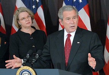 WASHINGTON  - SPETEMBER 27: U.S. President George W. Bush speaks before signing H.R. 2669, the College Cost Reduction and Access Act, as U.S. Secretary of Education Margaret Spellings listens at the White House September 27, 2007 in Washington, The act make college more affordable for low-income students by increasing funding for Federal Pell Grants by more than $11 billion.   (Photo by Ron Sachs-Pool/Getty Images)