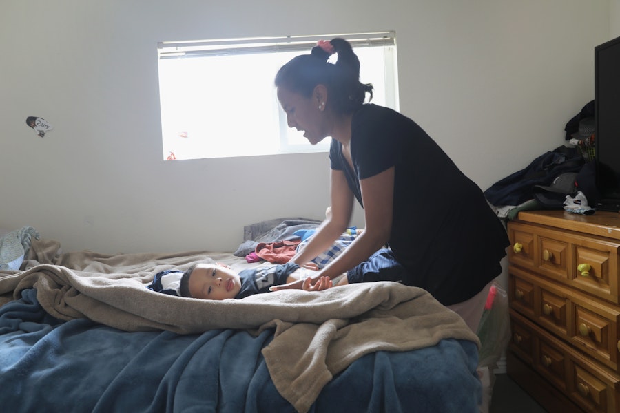 DENVER, CO - JUNE 06:  Undocumented immigrant activist Jeanette Vizuerra changes her grandson's diaper on June 6, 2017 in Denver, Colorado. Vizguerra was given a temporary stay of deportation by ICE in May after taking sanctuary in Denver churches for three months. Vizguerra, who is from Mexico, has lived in the United States for twenty  years and has three U.S.-born children. U.S. Immigration and Customs Enforcement (ICE), agents, emboldened by the leadership of President Donald Trump, have almost doubled arrests of undocumented immigrants, many of whom without criminal records, up from the previous year. The soaring number of detentions highlights a Trump campaign pledge to target the some 11 million people living as undocumented immigrants in the United States.  (Photo by John Moore/Getty Images) (Photo by John Moore/Getty Images)