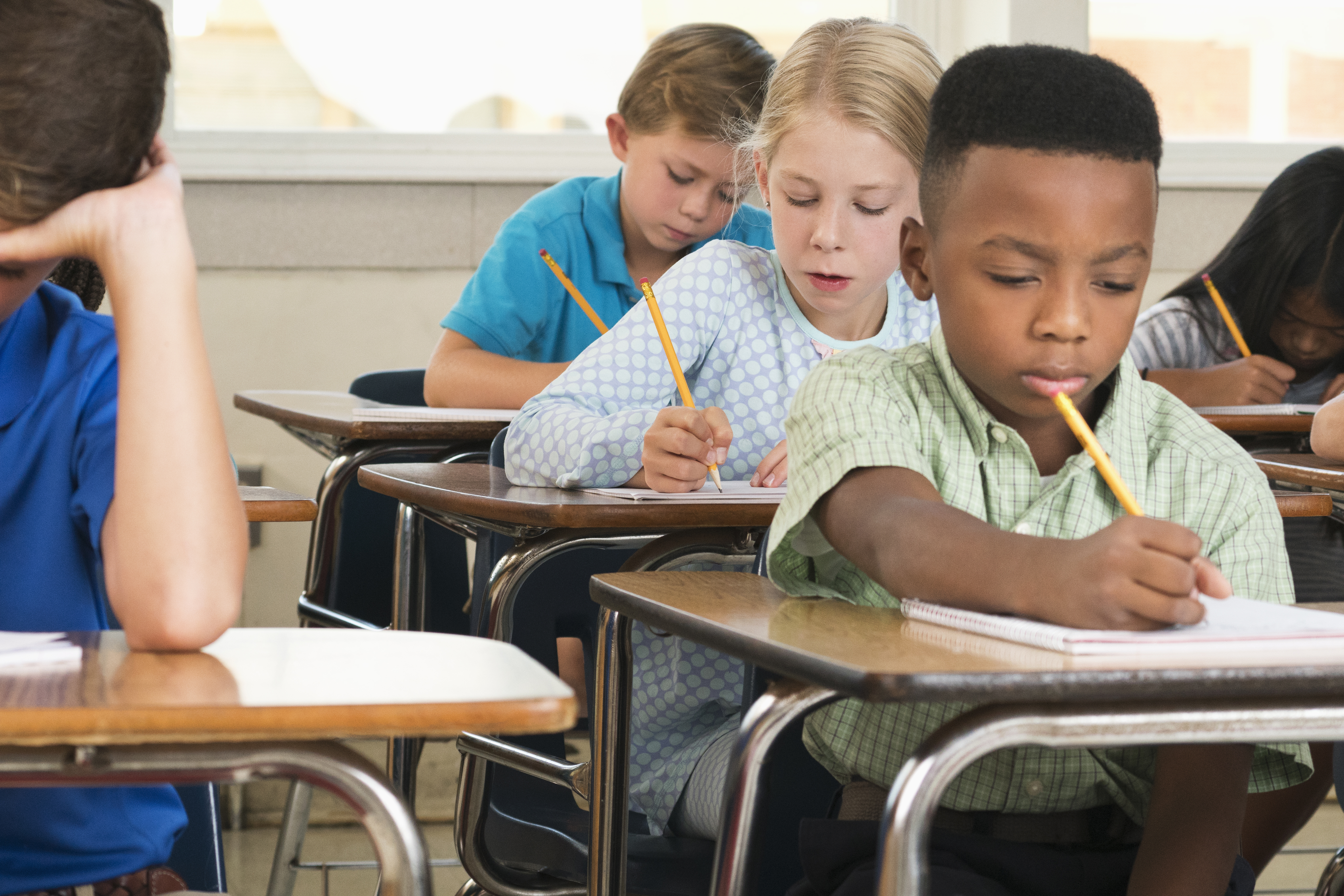 Students taking test in classroom