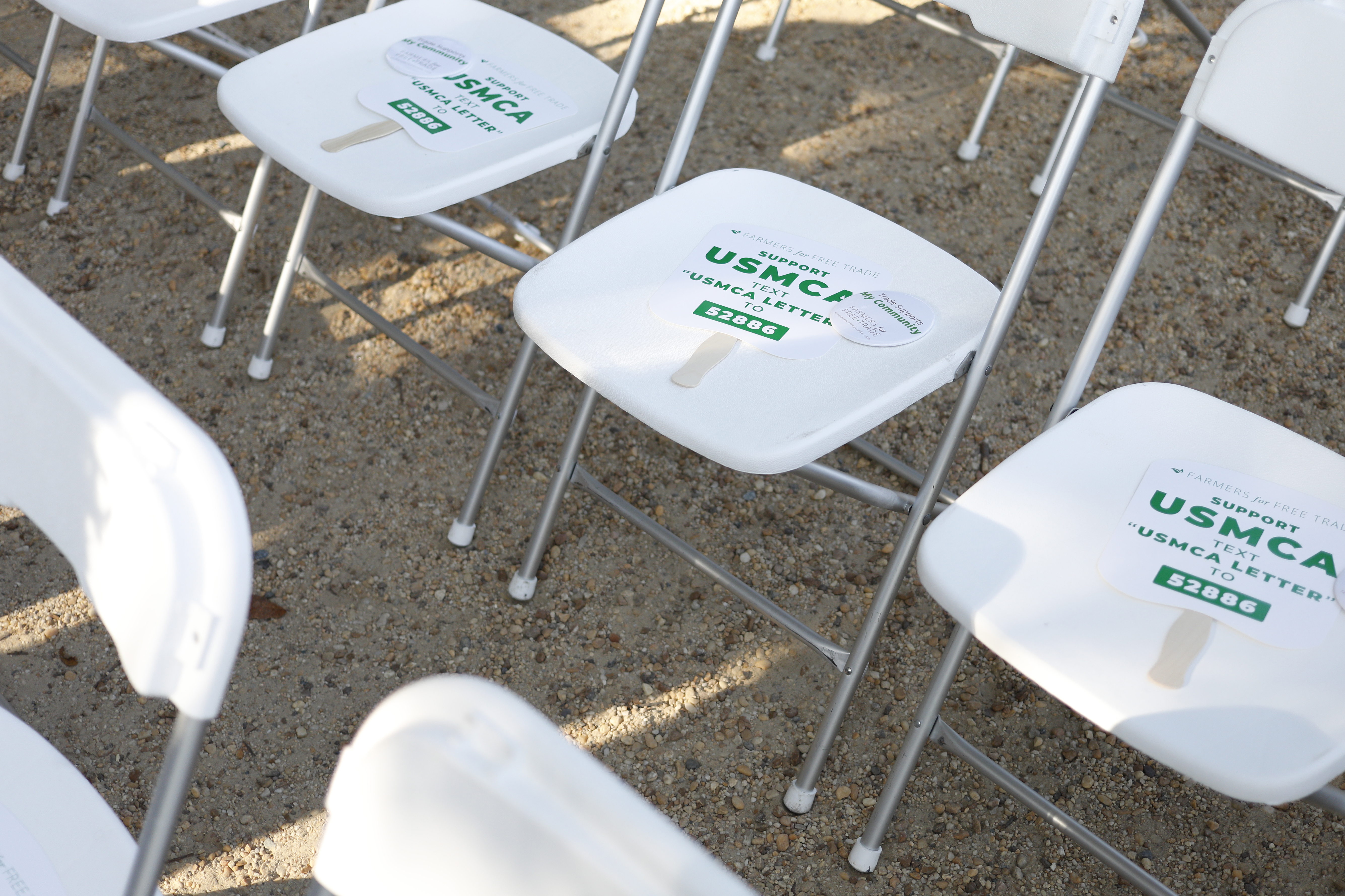 WASHINGTON, DC - SEPTEMBER 12: Paper signs of support are placed on audience members' chairs before a rally for the passage of the USMCA trade agreement, on September 12, 2019 in Washington, DC. Several agricultural groups including the American Farm Bureau Federation, the American Soybean Association and the National Corn Growers Association held the rally to urge Congress to ratify the trade deal. (Photo by Tom Brenner/Getty Images).