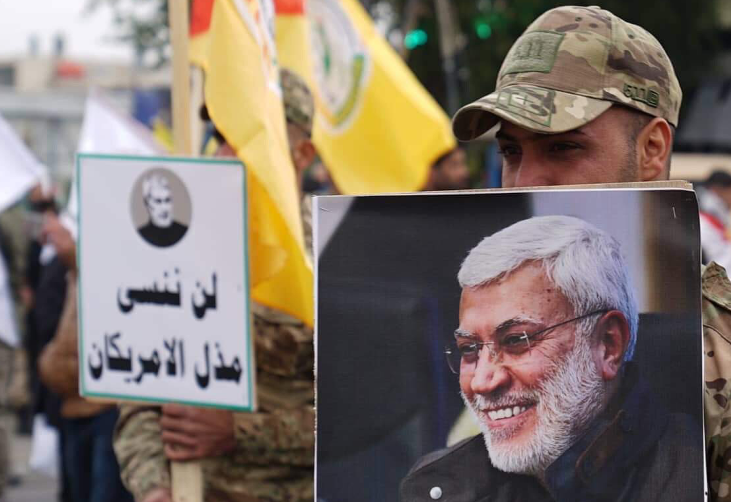 Iranian Commanders holding signage