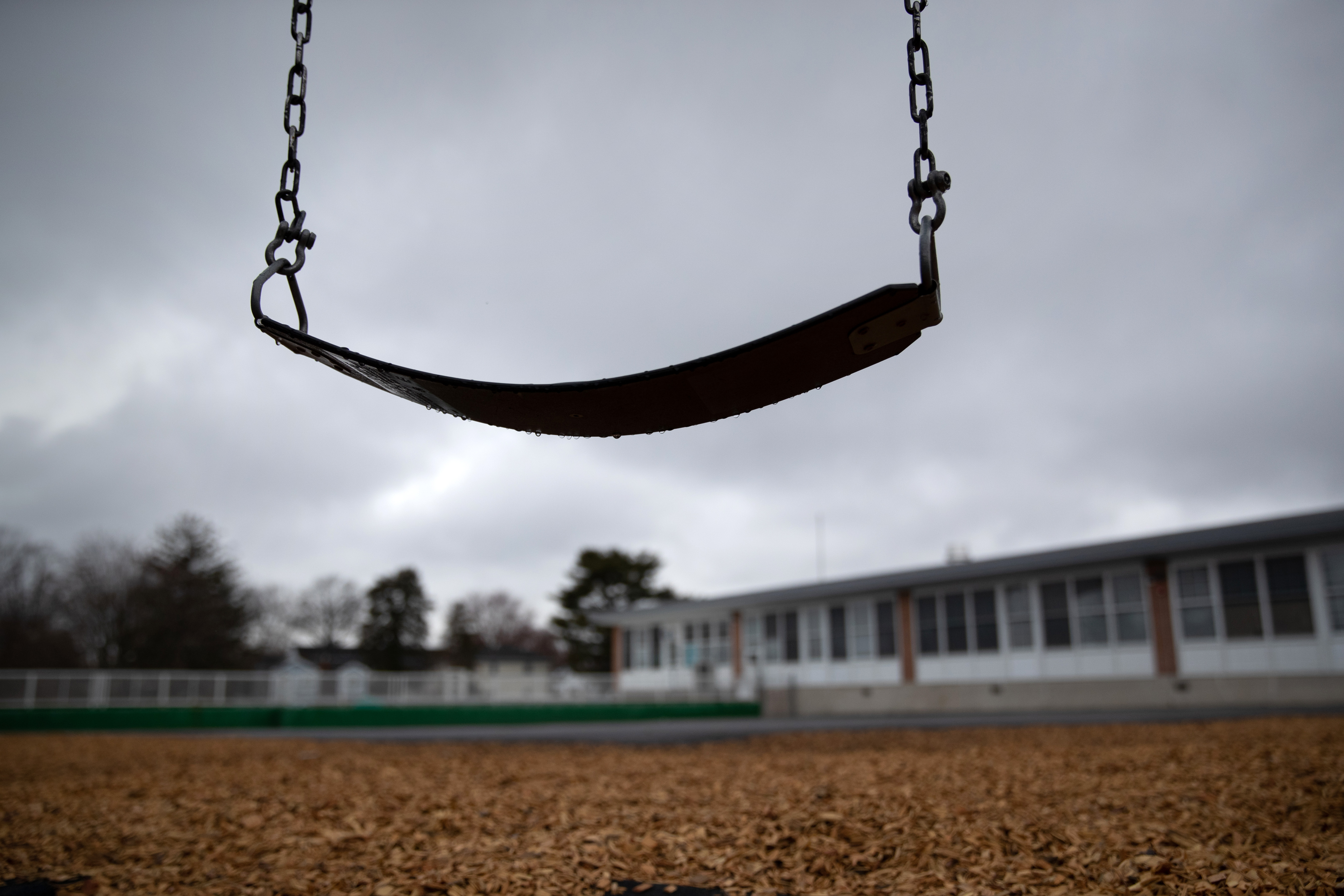 STAMFORD,  - MARCH 17: A playground swing hangs at the KT Murphy Elementary School on March 17, 2020 in Stamford, Connecticut. Stamford Public Schools closed last week to help slow the spread of the COVID-19.  (Photo by John Moore/Getty Images)