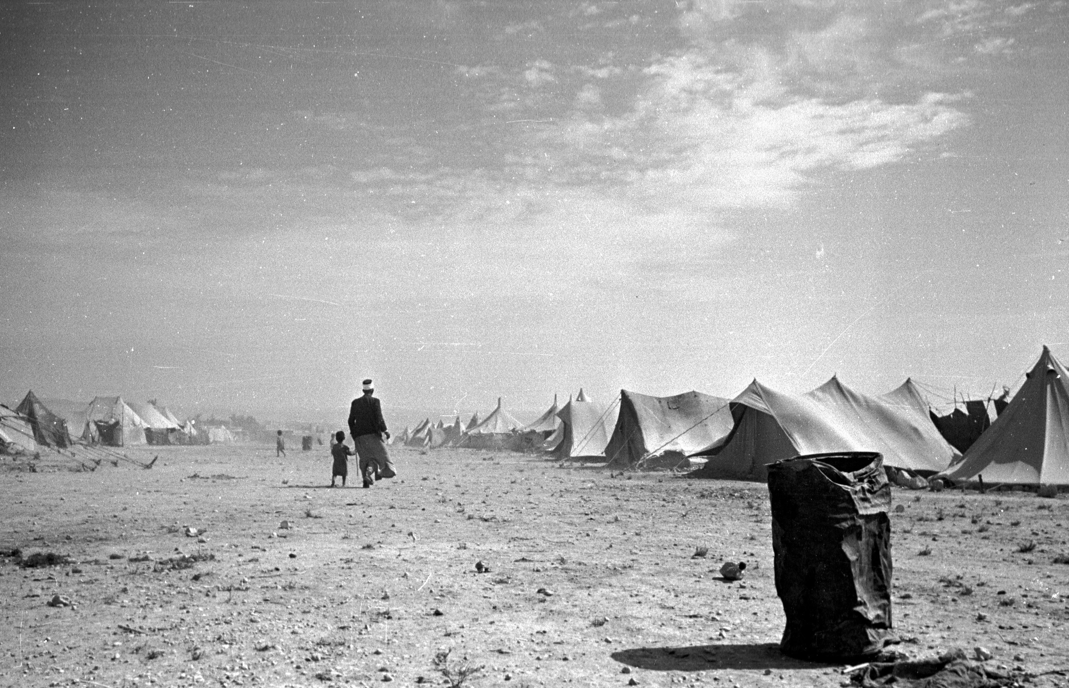 25th June 1949:  A Palestinian refugee camp near the shores of the Dead Sea in Jordan, in the year following the Arab Israeli War which marked the creation of the State of Israel. Original Publication: Picture Post - 4818 - Who'll Help The Refugee Arabs? - pub. 1949  (Photo by Charles Hewitt/Picture Post/Hulton Archive/Getty Images)