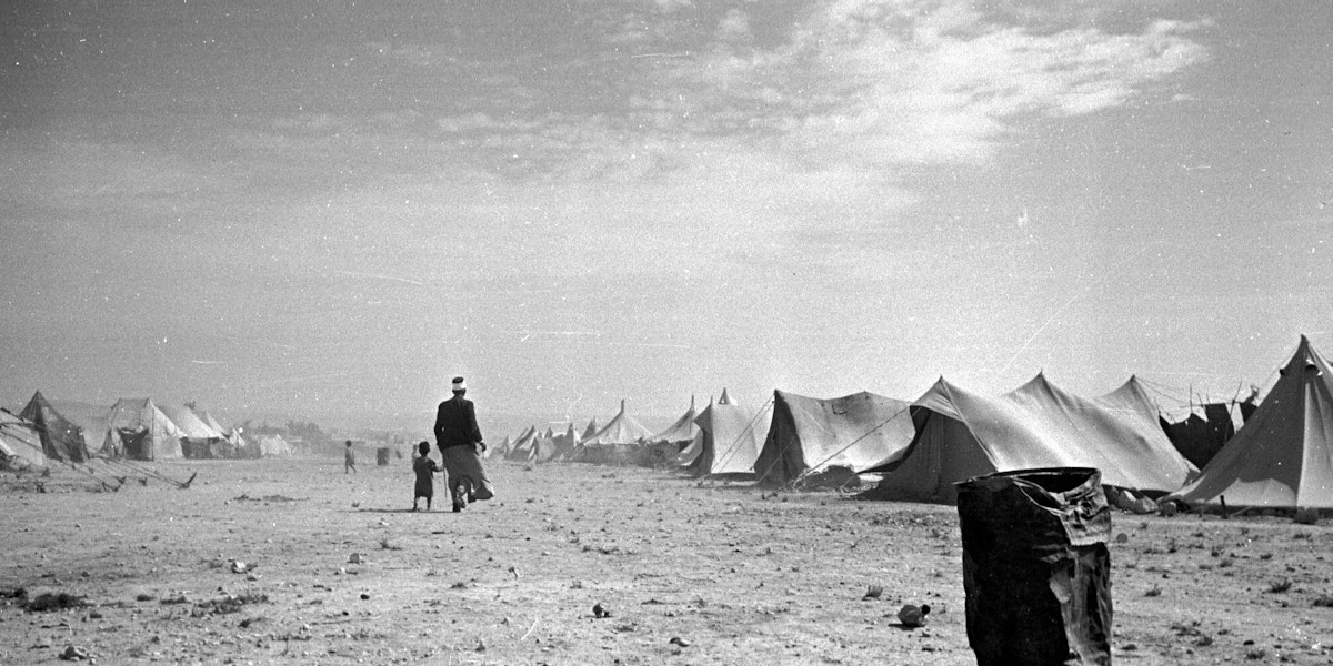 25th June 1949: A Palestinian refugee camp near the shores of the Dead Sea in Jordan, in the year following the Arab Israeli War which marked the creation of the State of Israel. Original Publication: Picture Post - 4818 - Who'll Help The Refugee Arabs? - pub. 1949 (Photo by Charles Hewitt/Picture Post/Hulton Archive/Getty Images)