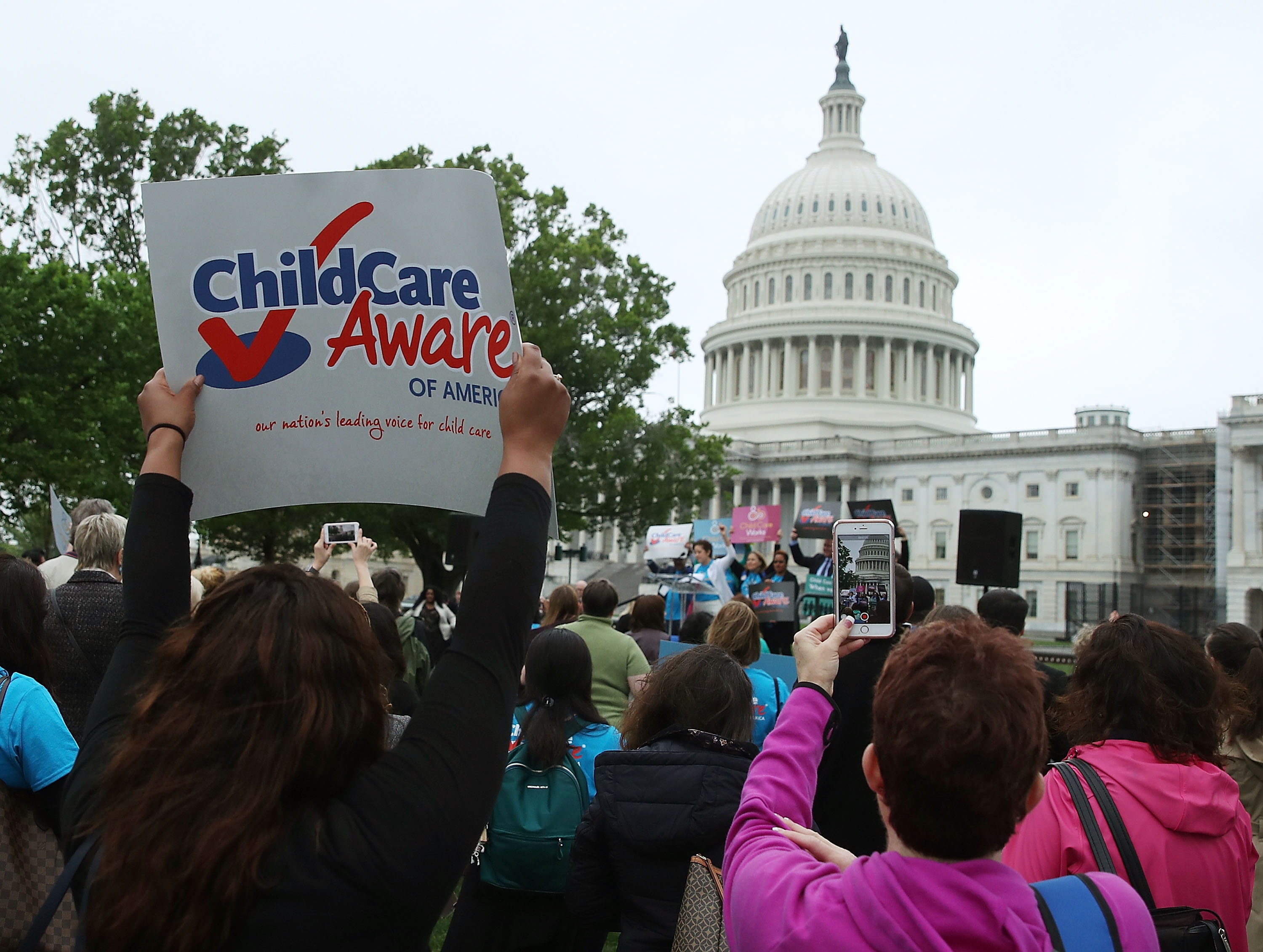 WASHINGTON, DC - APRIL 25:  People participate in an affordable child care rally at the U.S. Capitol, on April 25, 2017 in Washington, DC. The group Child Care Aware rallied to raise awareness of the need for quality, affordable child care that is accessible for all families. (Photo by Mark Wilson/Getty Images)