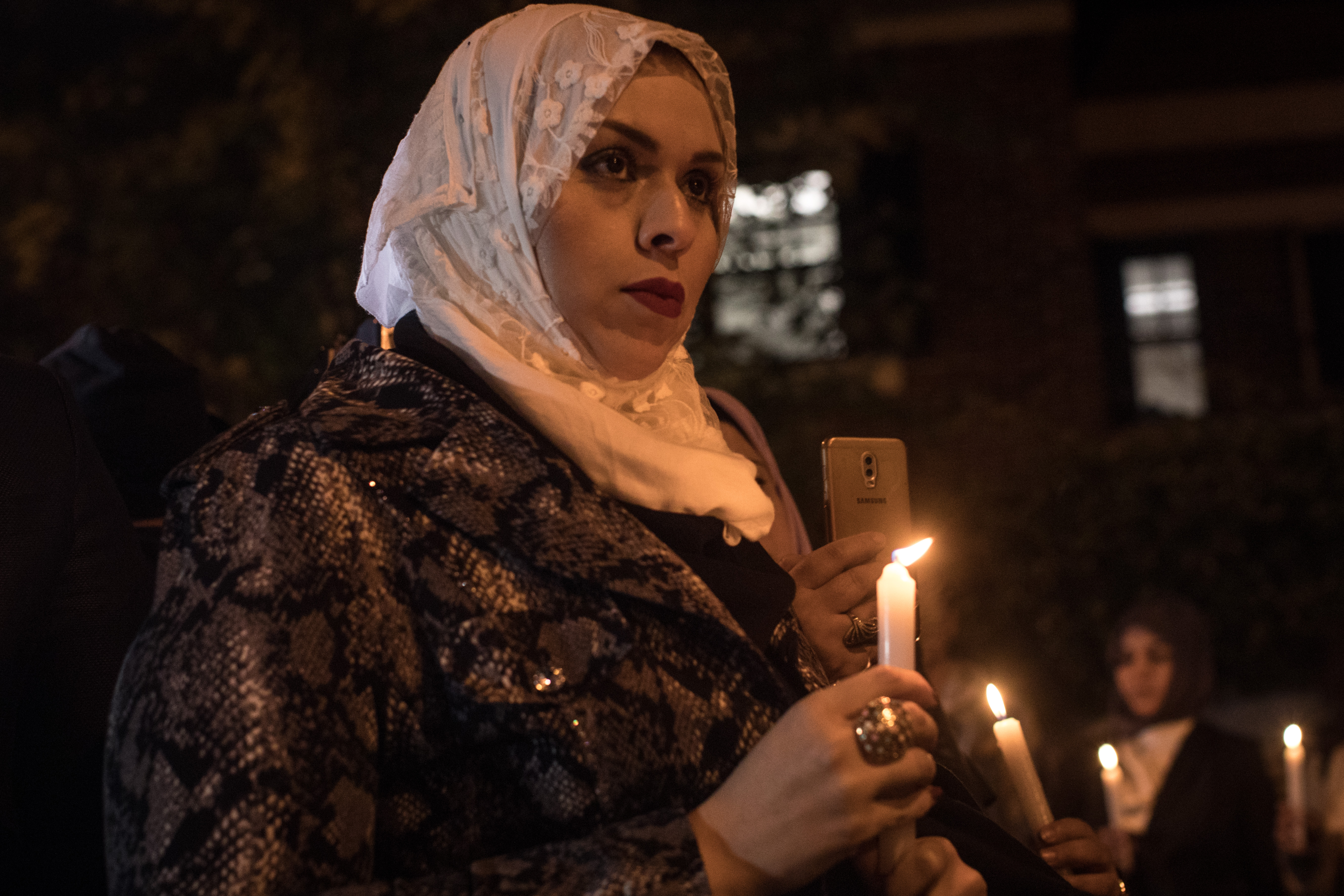 ISTANBUL, TURKEY - OCTOBER 25:  A woman takes part in a candle light vigil to remember journalist Jamal Khashoggi outside the Saudi Arabia consulate on October 25, 2018 in Istanbul, Turkey. Jamal Khashoggi, a U.S. resident and critic of the Saudi regime, went missing after entering the Saudi Arabian consulate in Istanbul on October 2. More than two weeks later Riyadh announced he had been killed accidentally during an altercation with Saudi consulate officials, however as investigations continue new information surfaced, pointing to a brutal and planned murder contradicting previous claims.  (Photo by Chris McGrath/Getty Images)