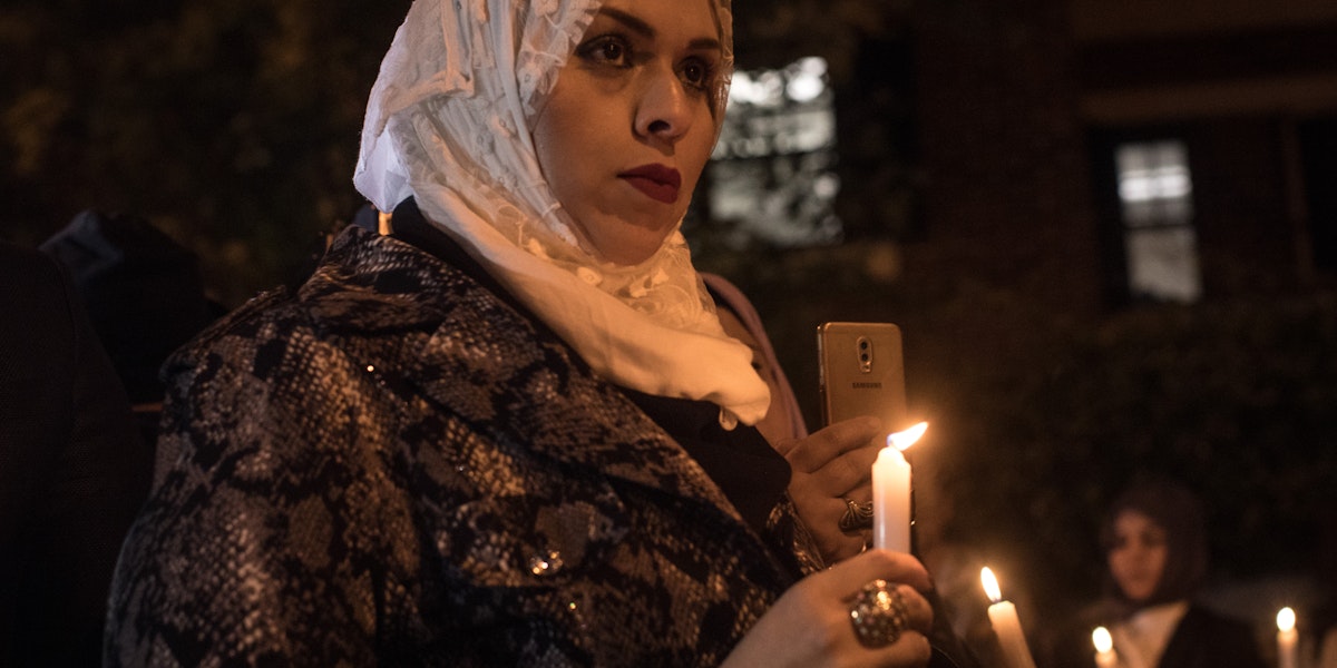 ISTANBUL, TURKEY - OCTOBER 25: A woman takes part in a candle light vigil to remember journalist Jamal Khashoggi outside the Saudi Arabia consulate on October 25, 2018 in Istanbul, Turkey. Jamal Khashoggi, a U.S. resident and critic of the Saudi regime, went missing after entering the Saudi Arabian consulate in Istanbul on October 2. More than two weeks later Riyadh announced he had been killed accidentally during an altercation with Saudi consulate officials, however as investigations continue new information surfaced, pointing to a brutal and planned murder contradicting previous claims. (Photo by Chris McGrath/Getty Images)