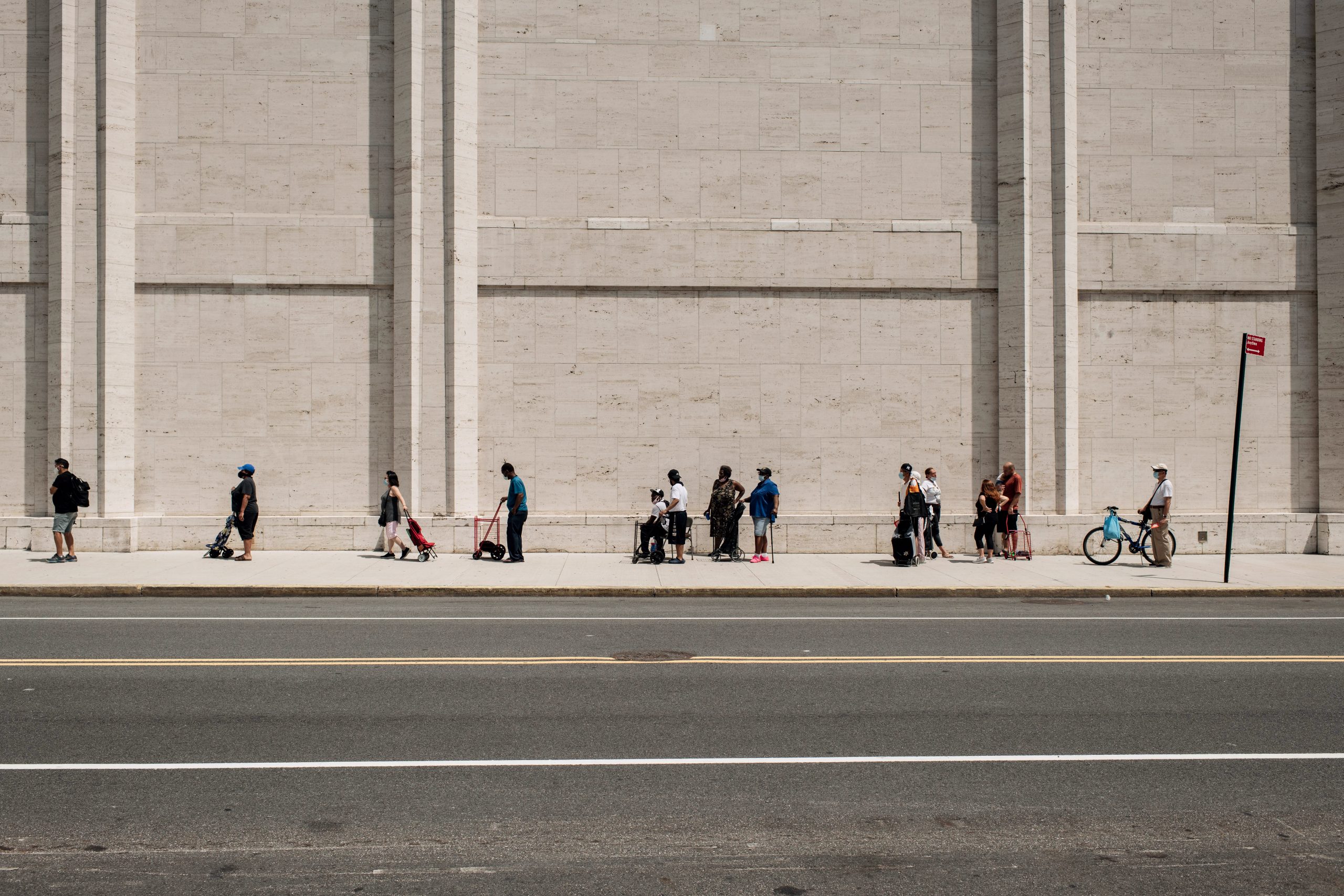 NEW YORK, NY - JULY 29: New Yorkers in need wait in a long line to receive free produce, dry goods, and meat at a Food Bank For New York City distribution event at Lincoln Center on July 29, 2020 in New York City. In addition to unemployment and homelessness, millions of Americans face food insecurity as a result of the economic downturn caused by the coronavirus pandemic. (Photo by Scott Heins/Getty Images)