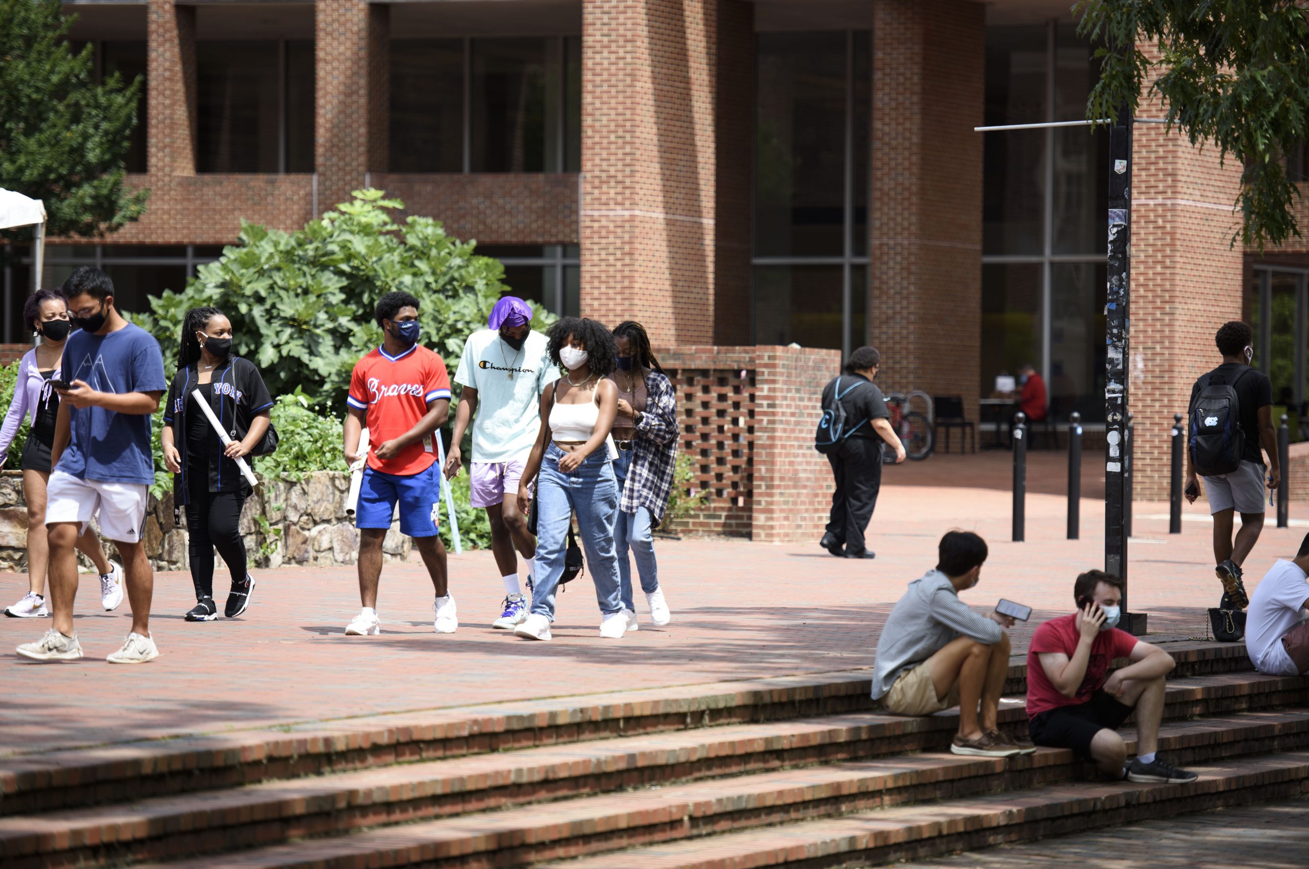 CHAPEL HILL, NC - AUGUST 18: Students walk through the campus of the University of North Carolina at Chapel Hill on August 18, 2020 in Chapel Hill, North Carolina.The school halted in-person classes and reverted back to online courses after a rise in the number of COVID-19 cases over the past week. (Photo by Melissa Sue Gerrits/Getty Images)