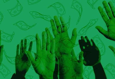 Photograph of hands in the air with money falling