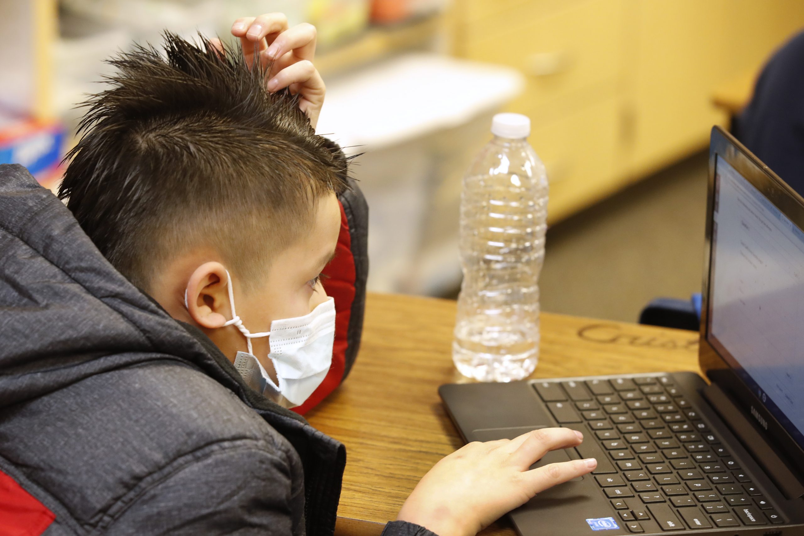 PROVO, UT - FEBRUARY 10: A student works on a computer at Freedom Preparatory Academy on February 10, 2021 in Provo, Utah. Freedom Academy has done in person instruction since the middle of August  of 2020 with only four days of school canceled due to COVID-19 outbreak. (Photo by George Frey/Getty Images)