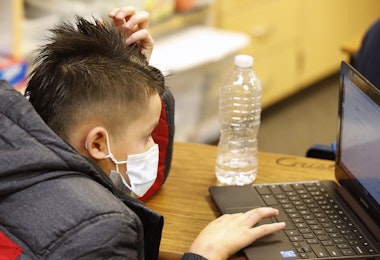 PROVO, UT - FEBRUARY 10: A student works on a computer at Freedom Preparatory Academy on February 10, 2021 in Provo, Utah. Freedom Academy has done in person instruction since the middle of August of 2020 with only four days of school canceled due to COVID-19 outbreak. (Photo by George Frey/Getty Images)
