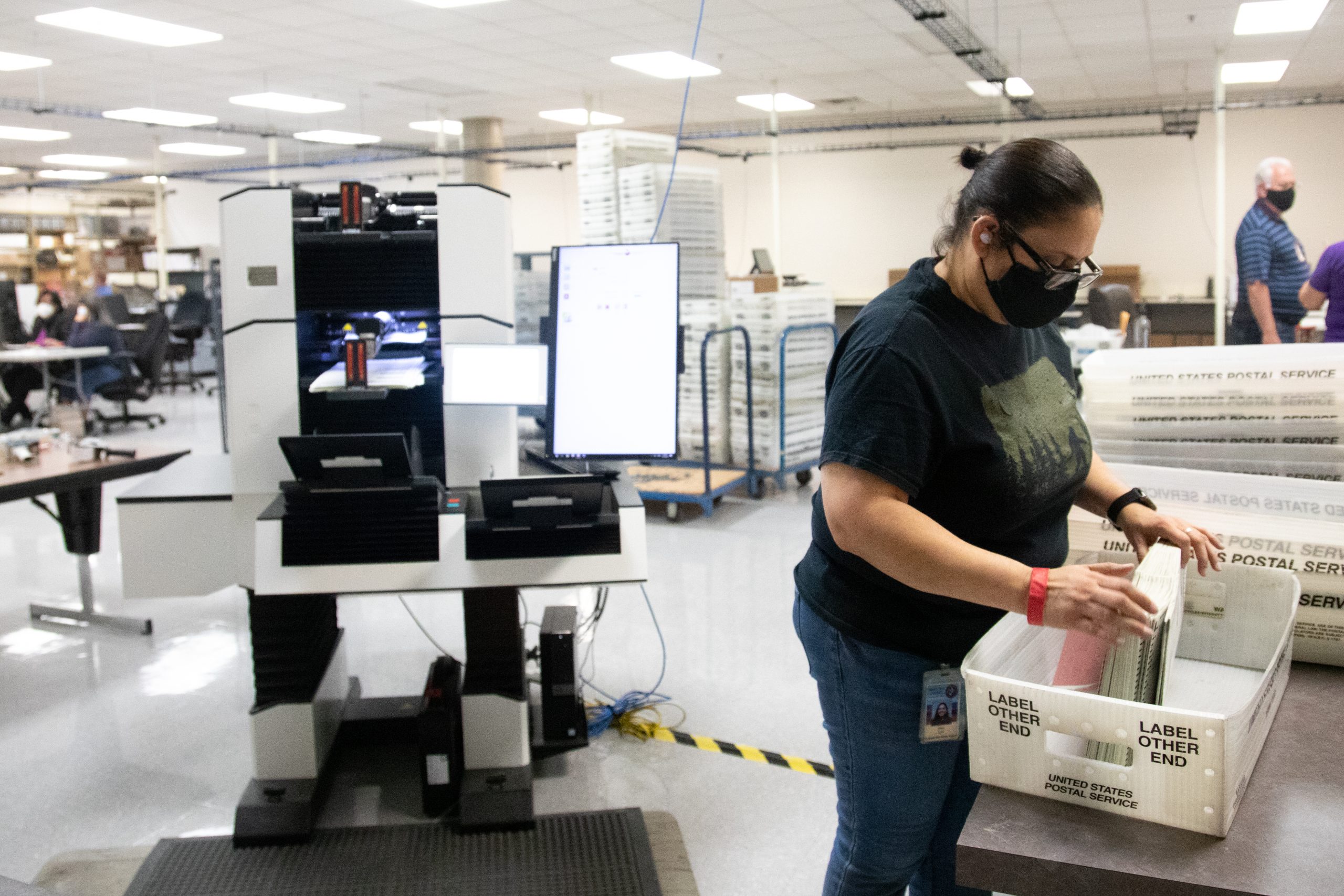 PHOENIX, AZ - OCTOBER 31: A Maricopa County Elections Department staff member counts ballots ahead of Tuesdays election on October 31, 2020 in Phoenix, Arizona. Early voting lasted from October 7th through the 30th in Arizona, which had a record number of early voters. (Photo by Courtney Pedroza/Getty Images)