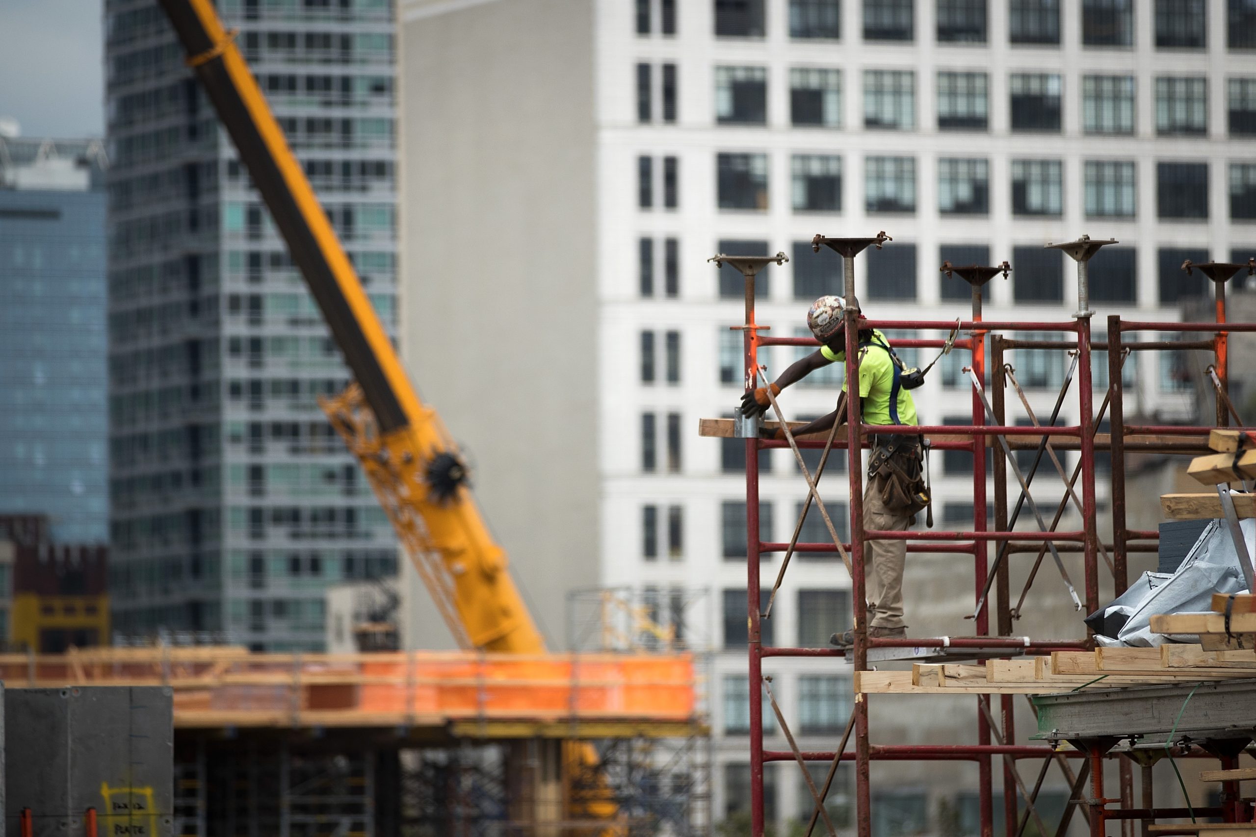 NEW YORK, NY - AUGUST 16: A construction laborer works on the site of a new residential building in the Hudson Yards development, August 16, 2016 in New York City. Home construction in the U.S. accelerated in July to the fastest pace in five months. While housing starts were up 2.1 percent nationally, new construction was up 15.5 percent in the Northeast, led by a surge in new apartment and condo construction. (Photo by Drew Angerer/Getty Images)