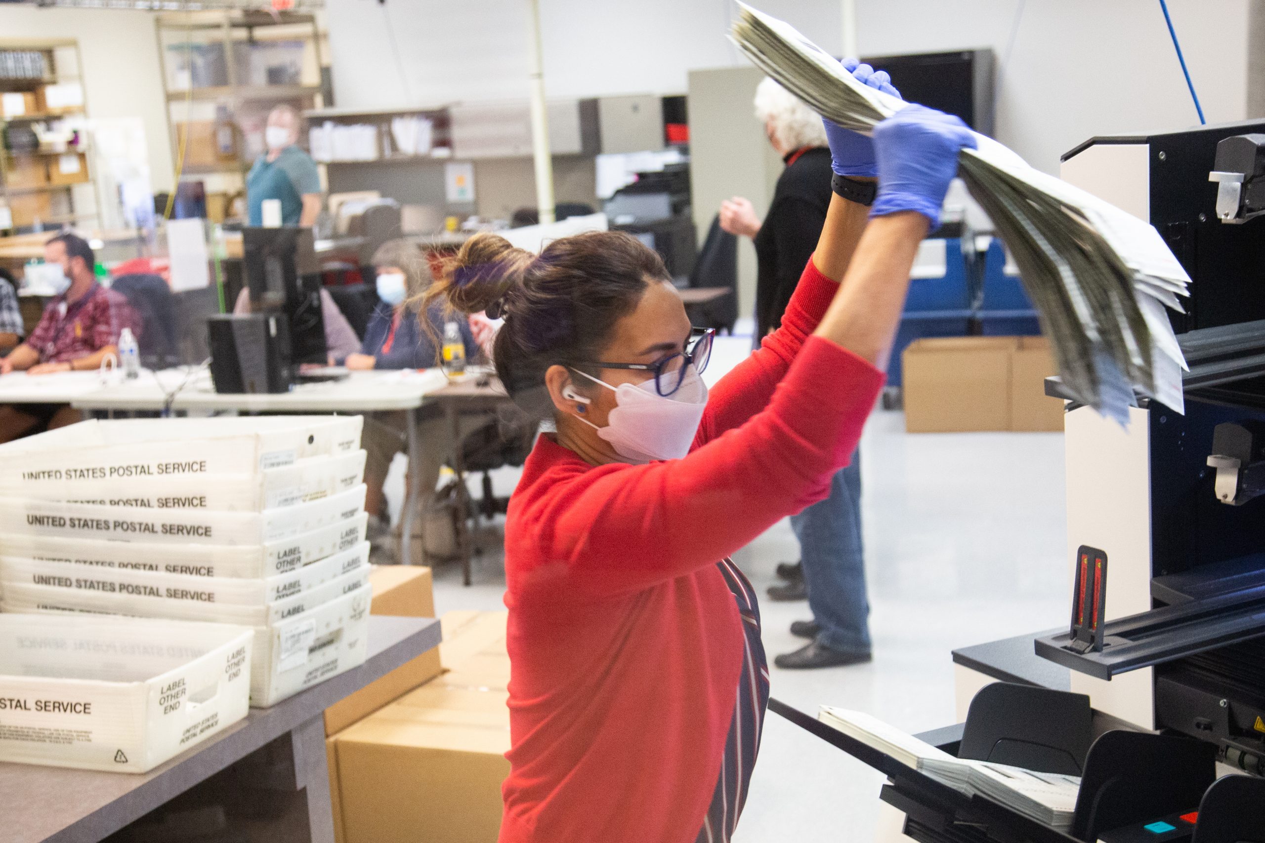 PHOENIX, AZ - NOVEMBER 05: Votes are counted by staff at the Maricopa County Elections Department office on November 5, 2020 in Phoenix, Arizona. Ballots continue to be counted in many critical battleground states as the final results in the U.S. presidential election remain too close to call. (Photo by Courtney Pedroza/Getty Images)