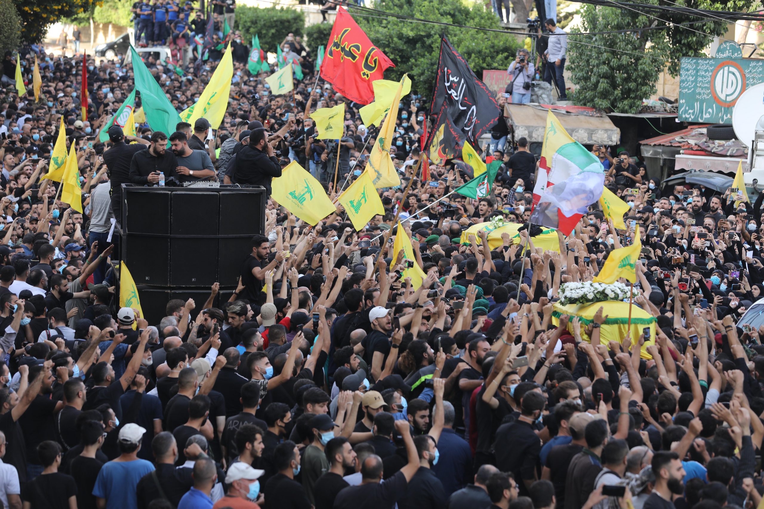 BEIRUT, LEBANON - OCTOBER 15: Supporters of Hezbollah mourn people killed in yesterday's clashes on October 15, 2021 in Beirut, Lebanon. On October 14th protests by the Hezbollah and Amal movements against the Beirut port explosion investigation left six people dead in a Christian quarter of the Lebanese capital, where civil war had sparked in 1975. (Photo by Marwan Tahtah/Getty Images)