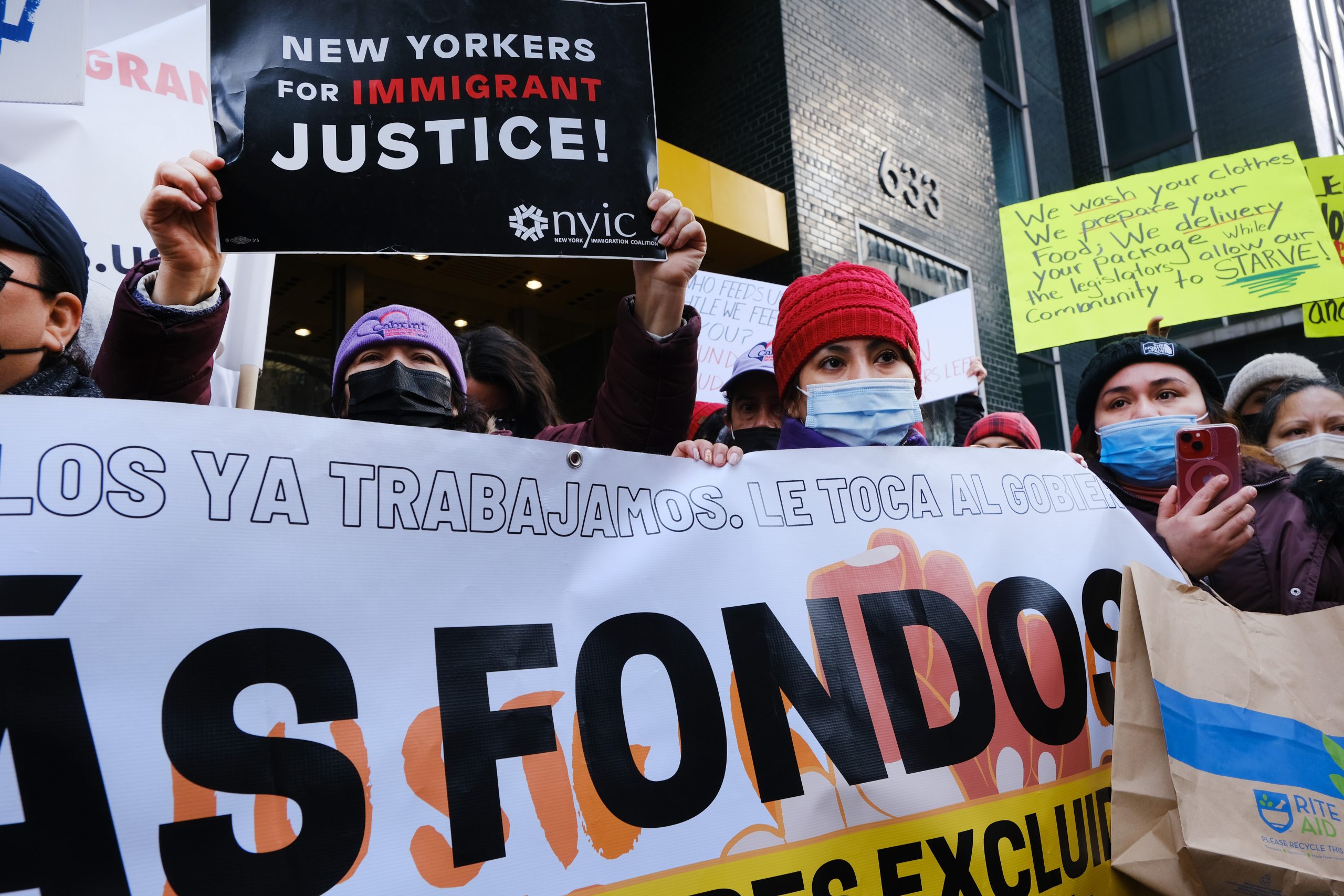 NEW YORK, NEW YORK - DECEMBER 10: Excluded workers, New Yorkers who had been shut out of pandemic-era assistance, march with their community allies to Governor Kathy Hochul’s midtown office on December 10, 2021 in New York City. The workers, most of whom are recent immigrants to America, are demanding an additional $3 billion for the Excluded Workers Fund. The Excluded Workers Fund was set up earlier this year to provide financial support for New Yorkers who had been shut out of pandemic-era assistance including stimulus checks and unemployment insurance. (Photo by Spencer Platt/Getty Images)