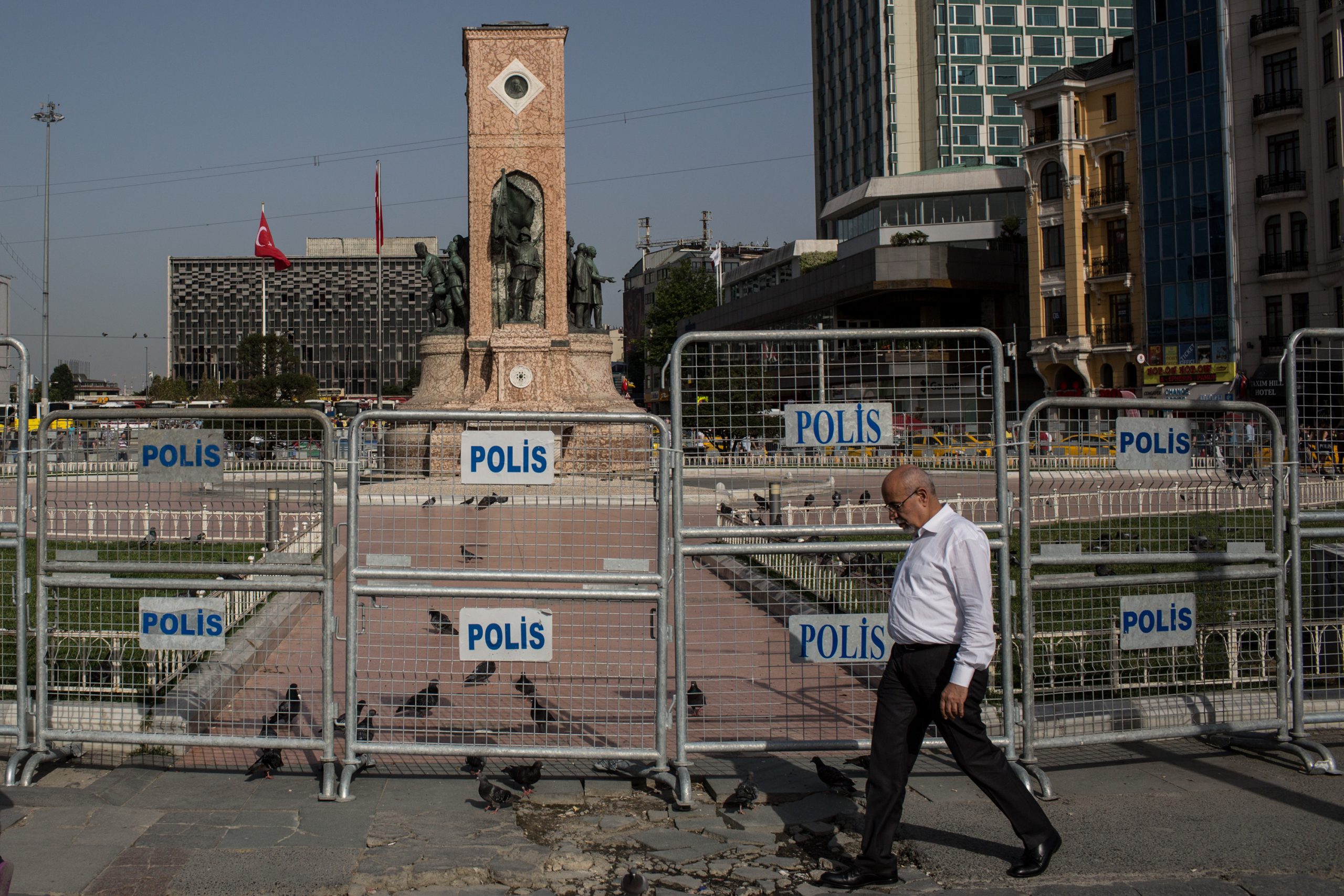 ISTANBUL, TURKEY - MAY 31: A man walks past police barricades surrounding Taksim Square and Gezi Park on the third anniversary of the Gezi Park protests on May 31, 2016 in Istanbul, Turkey. The protests began on May 28, 2013 to contest the planned urban development of Gezi Park, however larger protests started after police evicted protesters from the park sparking weeks of civil unrest.  (Photo by Chris McGrath/Getty Images)