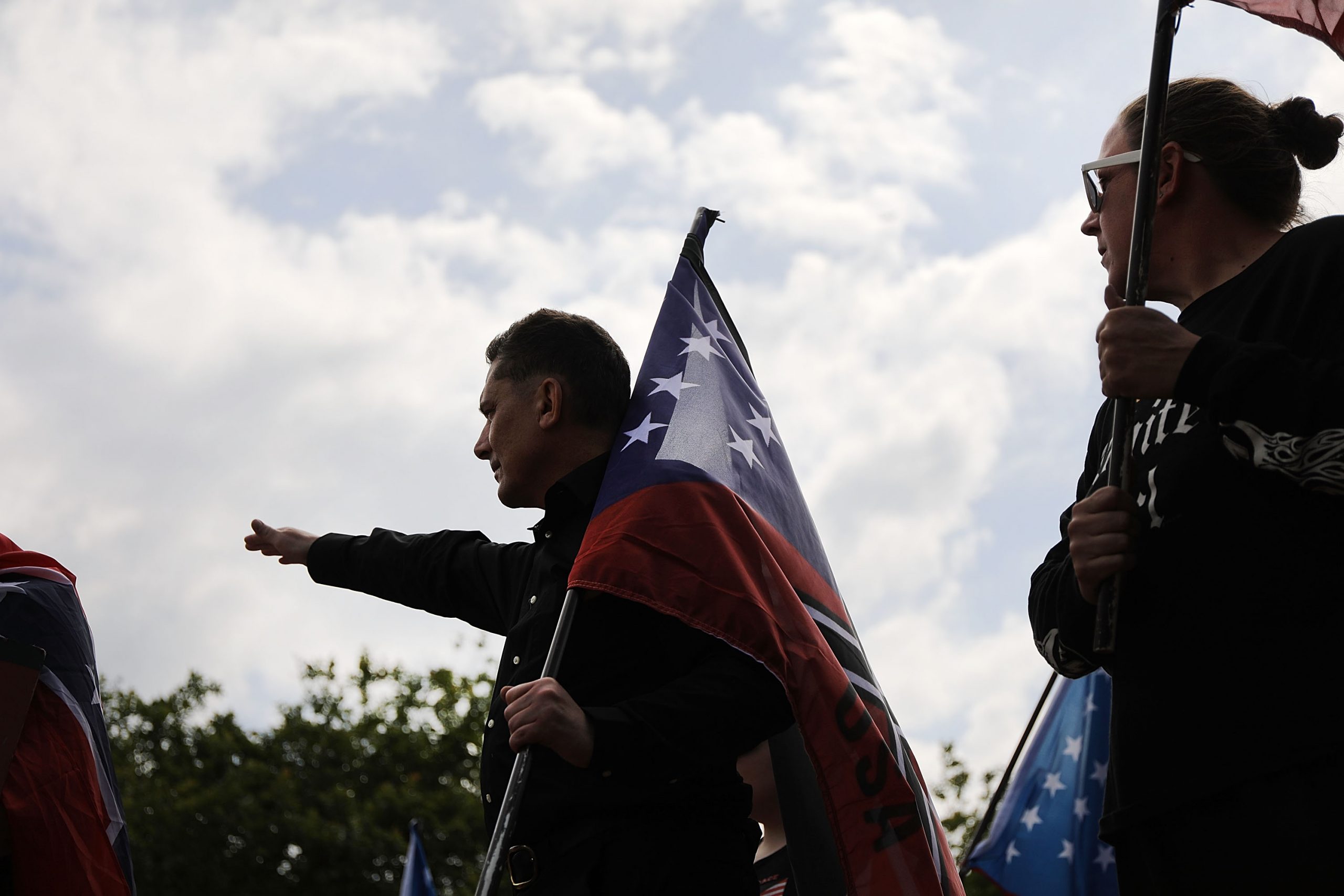 NEWNAN, GA - APRIL 21:  Members and supporters of the National Socialist Movement, one of the largest neo-Nazi groups in the US, hold a rally on April 21, 2018 in Newnan, Georgia. Community members have opposed the rally and have come out to embrace racial unity in the small Georgia town. Fearing a repeat of the violence that broke out after Charlottesville, hundreds of police officers are stationed in the town during the rally in an attempt to keep the anti racist protesters and neo-Nazi groups separated.  (Photo by Spencer Platt/Getty Images)