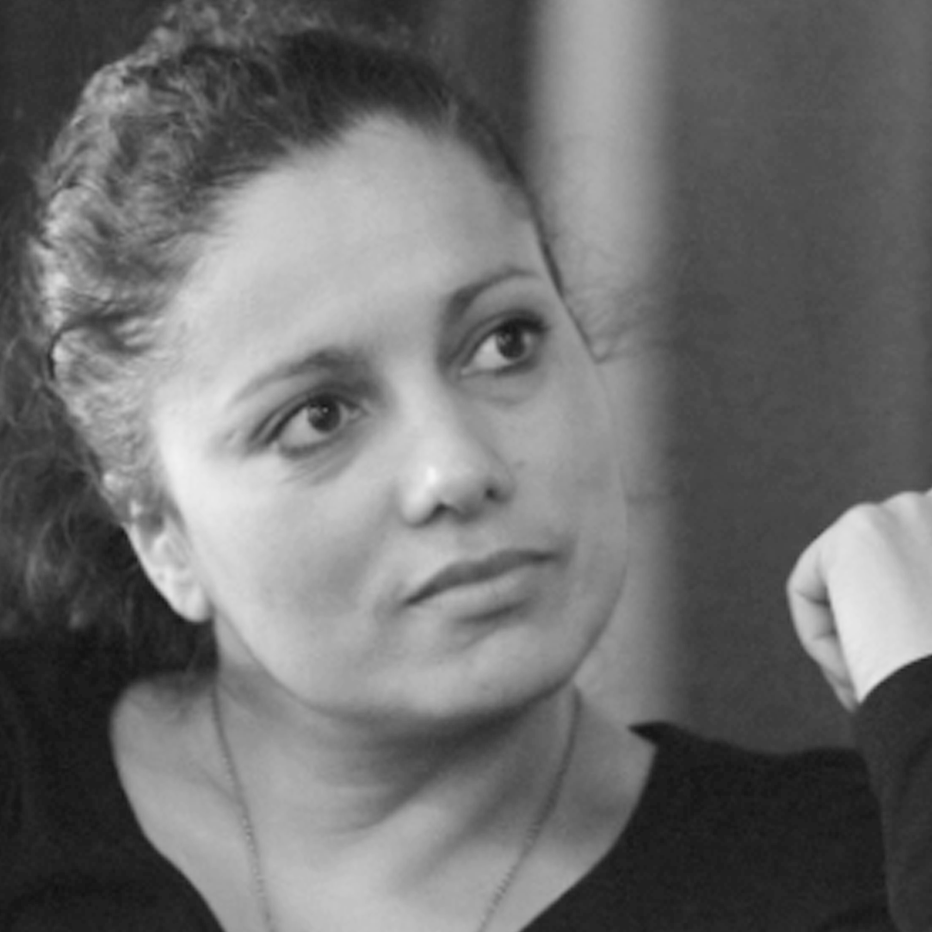 a black and white photo of a woman