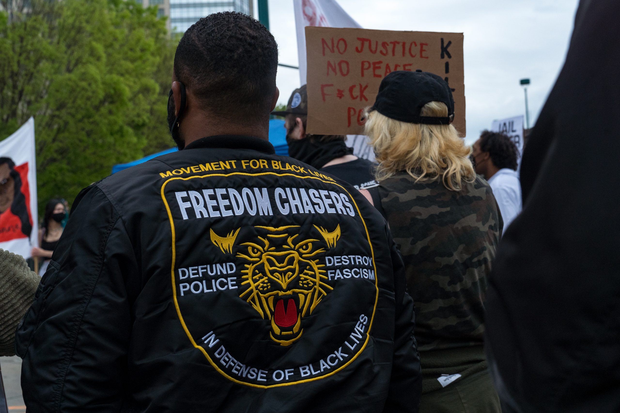 ATLANTA, GA - APRIL 14: Demonstrators march to the National Center for Civil and Human Rights while protesting the shooting death of Daunte Wright on April 14, 2021 in Atlanta, Georgia. Wright, a Black man who was stopped in Minnesota on Sunday, reportedly for an expired registration, was shot and killed by an officer who police say mistook her service revolver for a Taser.  (Photo by Megan Varner/Getty Images)