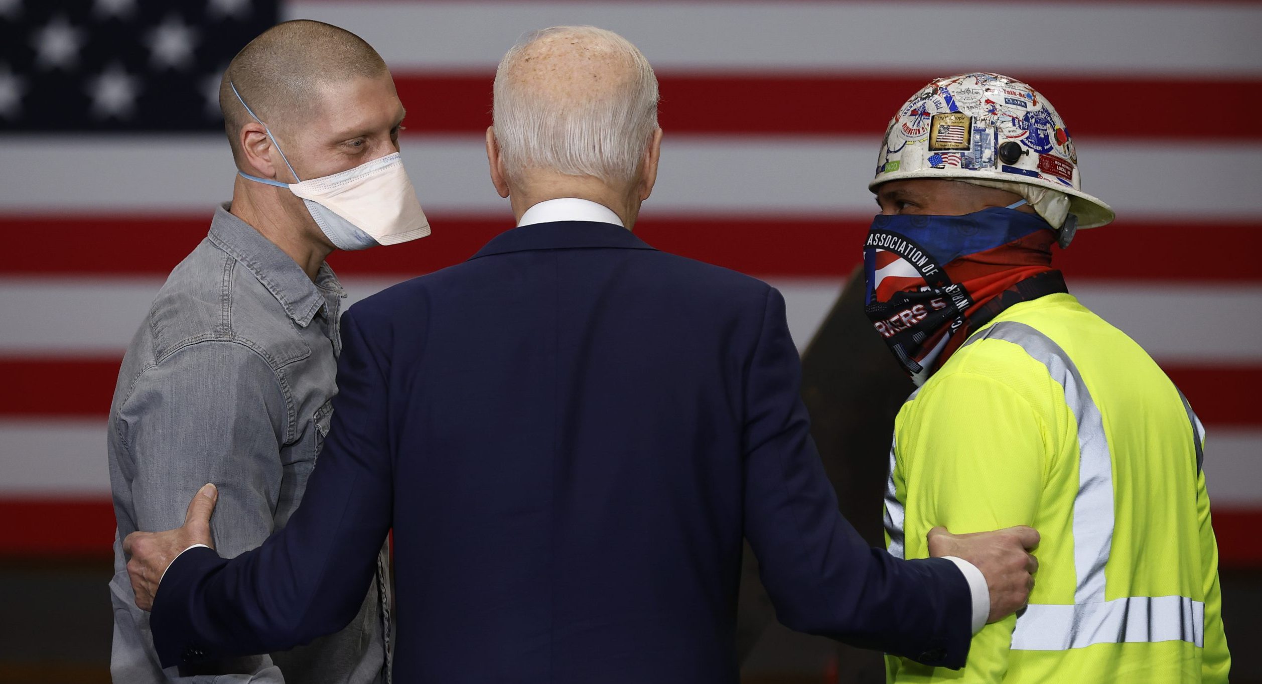 UPPER MARLBORO, MARYLAND - FEBRUARY 04: U.S. President Joe Biden speaks with members of Ironworkers Local 5 after signing an executive order on project labor agreements at the union's training hall on February 04, 2022 in Upper Marlboro, Maryland. Biden signed an executive order aimed at improving efficiency in federal procurement and alleviating coordination challenges that can slow progress on major government construction projects, according to the White House. (Photo by Chip Somodevilla/Getty Images)
