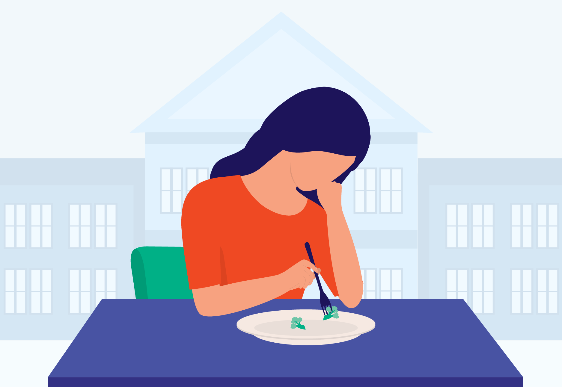 A student looks over their plate, which is mostly empty.