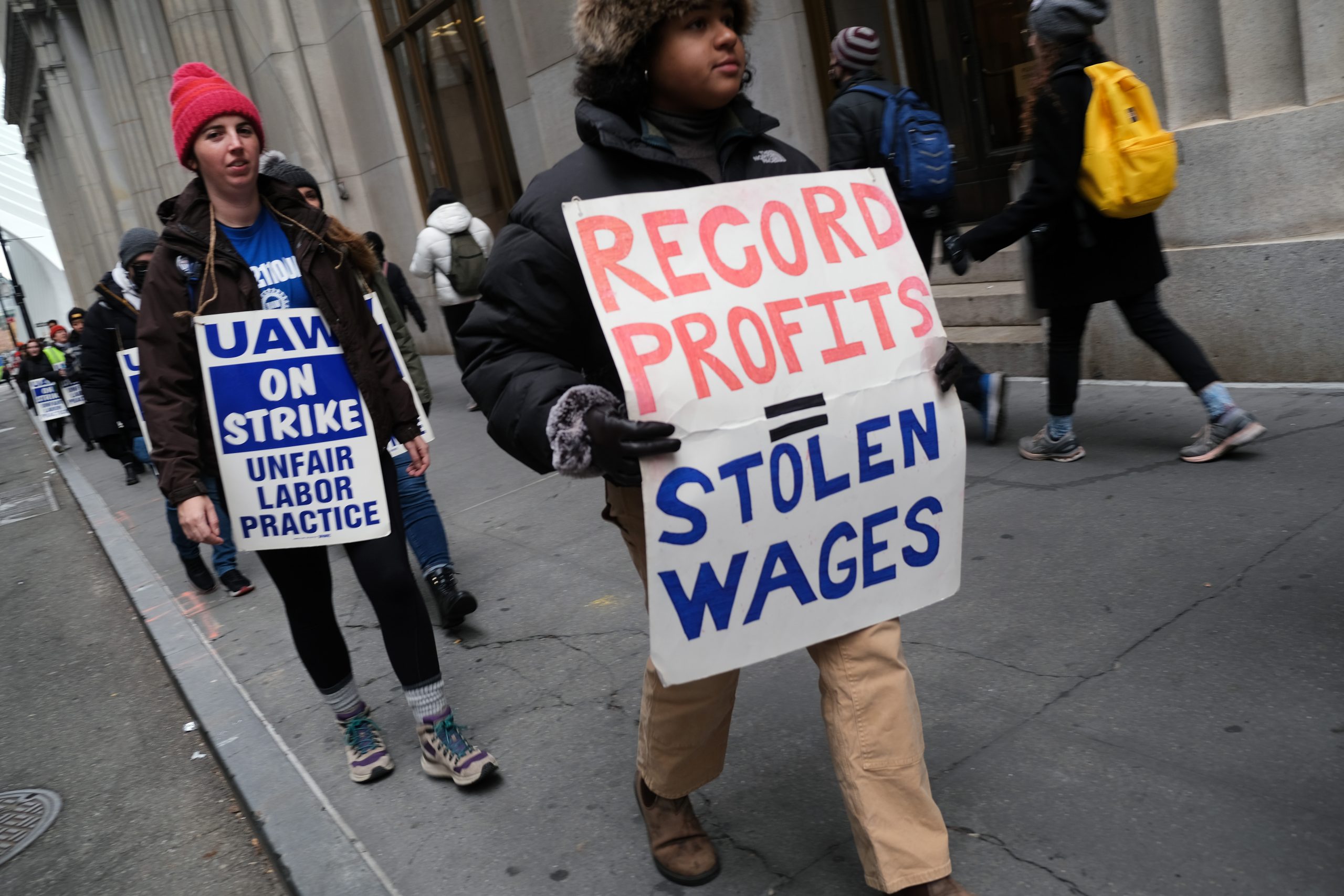 NEW YORK, NEW YORK - NOVEMBER 15: Employees of HarperCollins Publisher participate in a strike outside the company's offices in Manhattan on November 15, 2022 in New York City. The strikers, who work in a variety of departments at the company, have been bargaining for a union contract since December 2021. Salary, and a commitment to diversity and union security rights are some of the demands the workers have presented to the company. The union, Local 2110 of the UAW, represents more than 250 HarperCollins employees in the design, editorial legal, marketing, publicity, and sales departments. (Photo by Spencer Platt/Getty Images)
