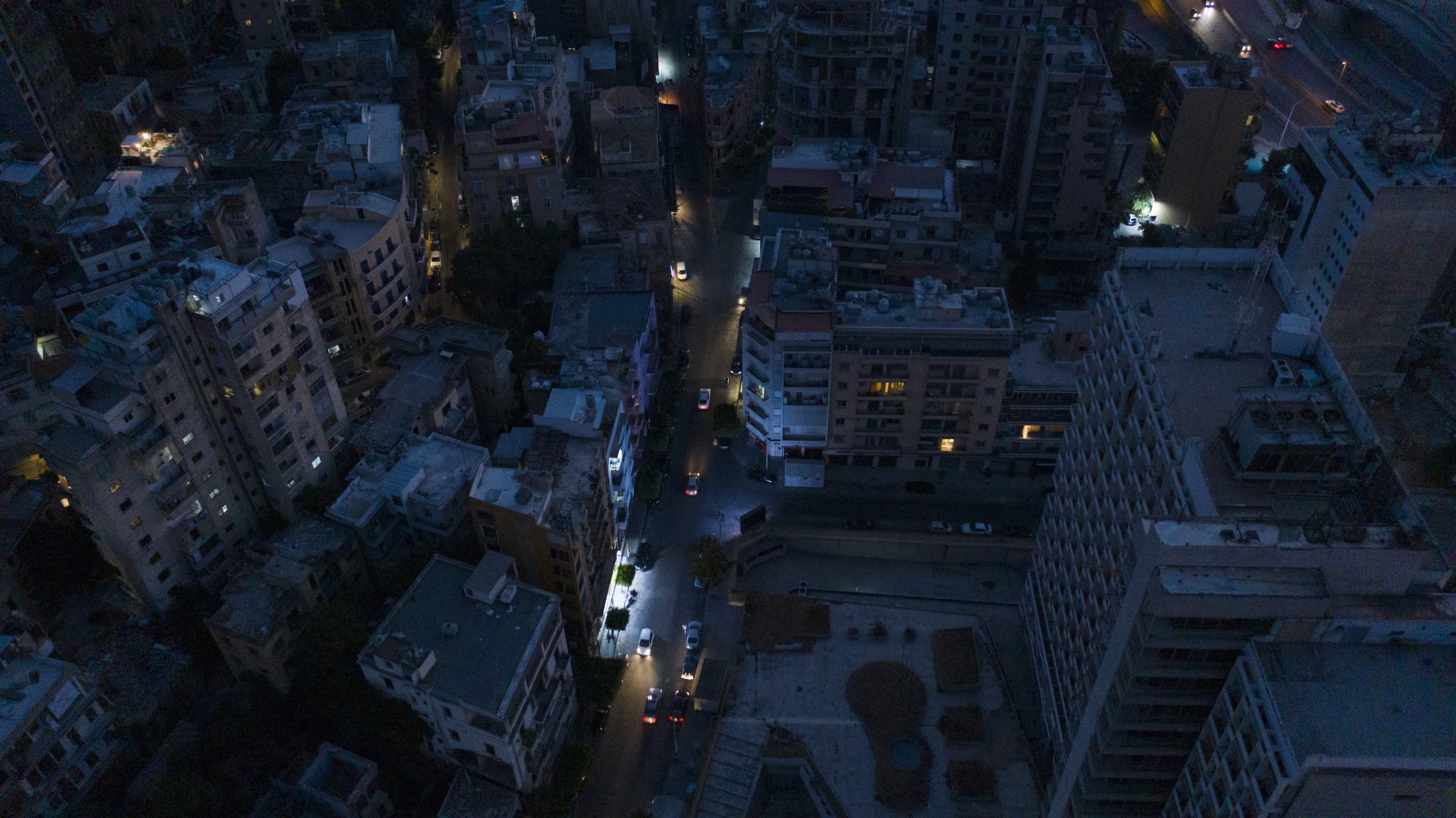 BEIRUT, LEBANON - AUGUST 02: An aerial view at dusk of the Mar Mikhael neighborhood near the port during a power outage on August 2, 2021 in Beirut, Lebanon. Electricite du Liban (EDL) warned against more drastic measures of rationing electricity that could completely interrupt the supply of current, if it fails to finance its operations. EDL issued the warning 