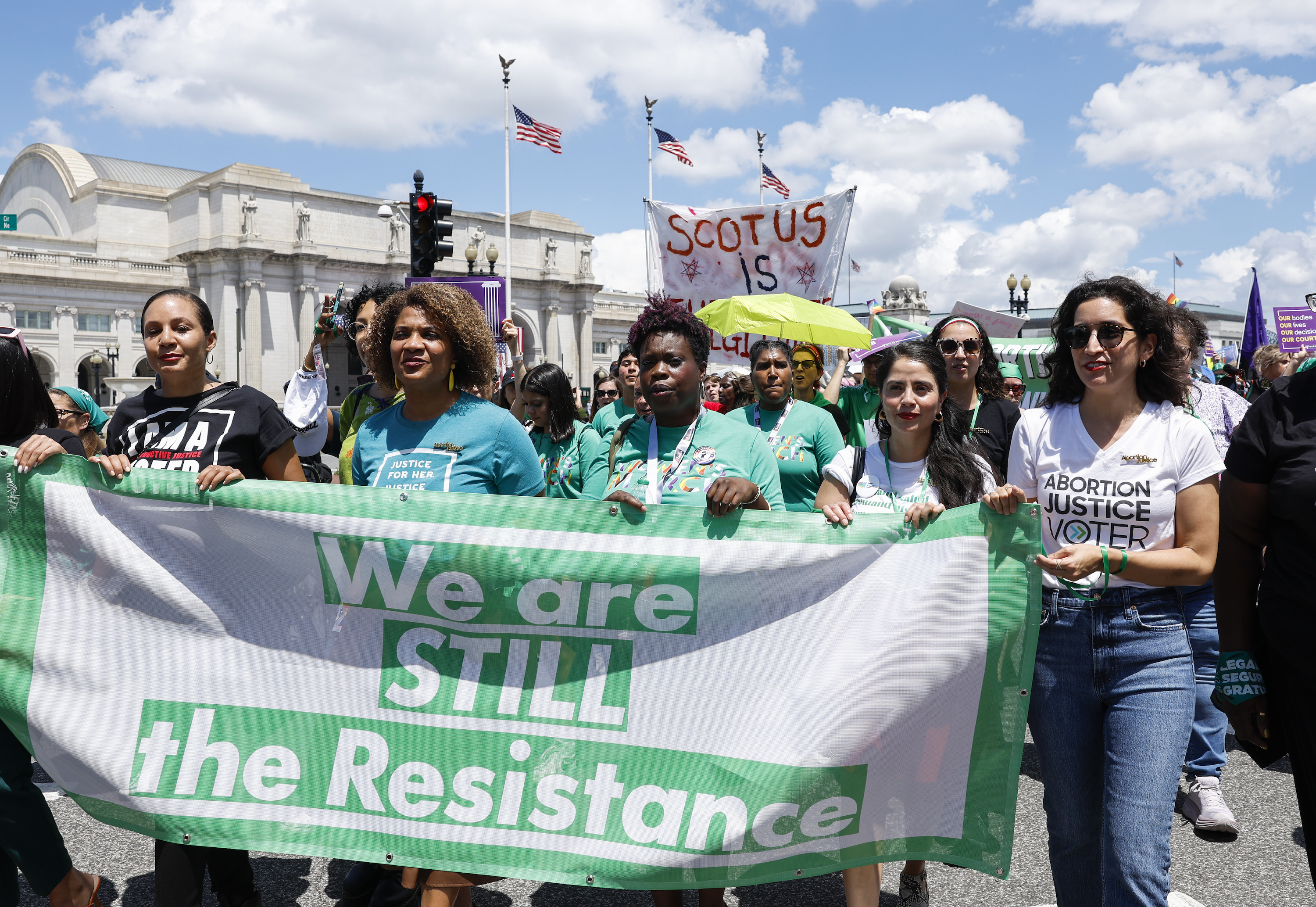 Abortion rights activists with Women's March participate in a march to the U.S. Supreme Court Building.