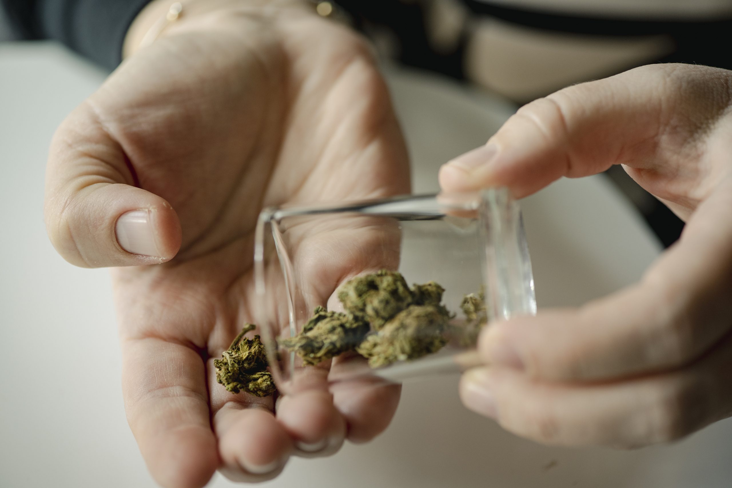 Close up of senior woman using cannabis at home