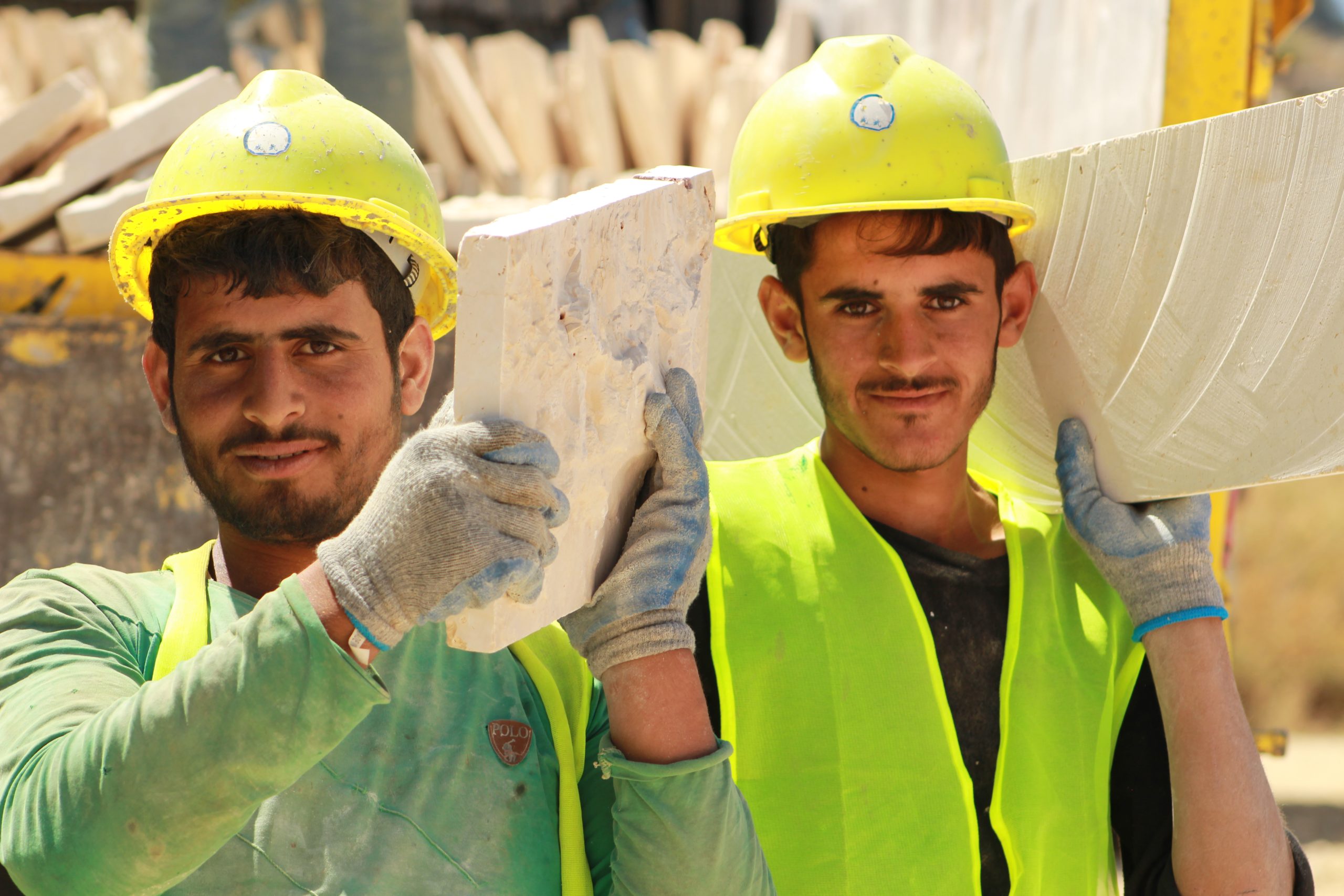 Workers work on building a water reservoir to serve the town of Hamanna to the east of Beirut in Lebanon, under the Employment Intensive Infrastructure Programme in Lebanon (EIIP). Credit : ILODate : 2018/07Country : Lebanon