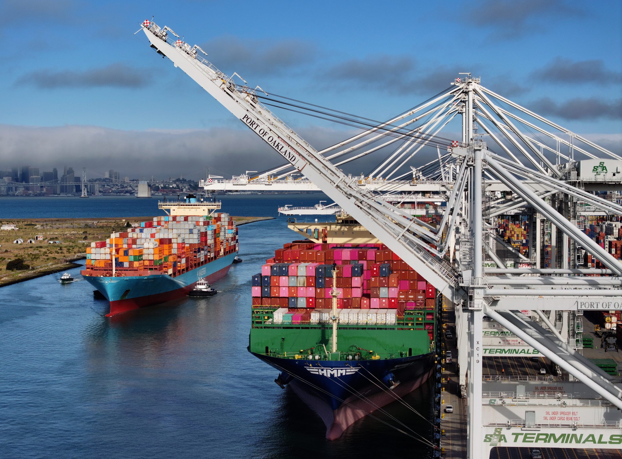 OAKLAND, CALIFORNIA - AUGUST 01: In an aerial view, a container ship arrives at the Port of Oakland on August 01, 2025 in Oakland, California. U.S. President Donald Trump announced that his August 1 deadline for trade deals will not be extended and sweeping tariffs will be imposed on certain countries beginning today. (Photo by Justin Sullivan/Getty Images)