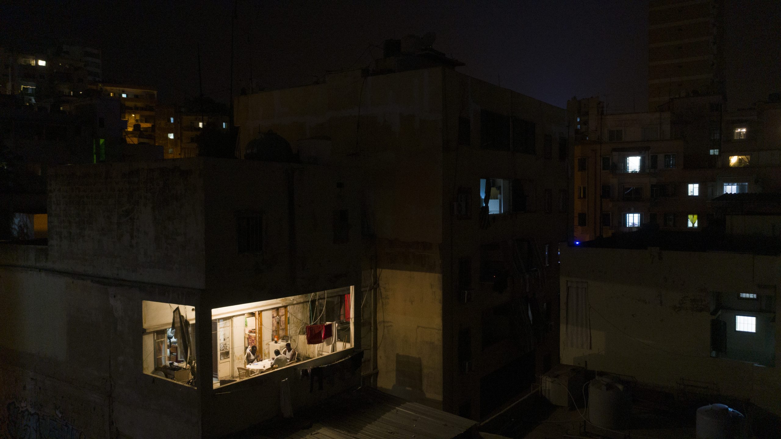 BEIRUT, LEBANON - AUGUST 02: A single apartment in Burj Hammud neighborhood is lit up during a power outage on August 2, 2021 in Beirut, Lebanon. Electricite du Liban (EDL) warned against more drastic measures of rationing electricity that could completely interrupt the supply of current, if it fails to finance its operations. EDL issued the warning 