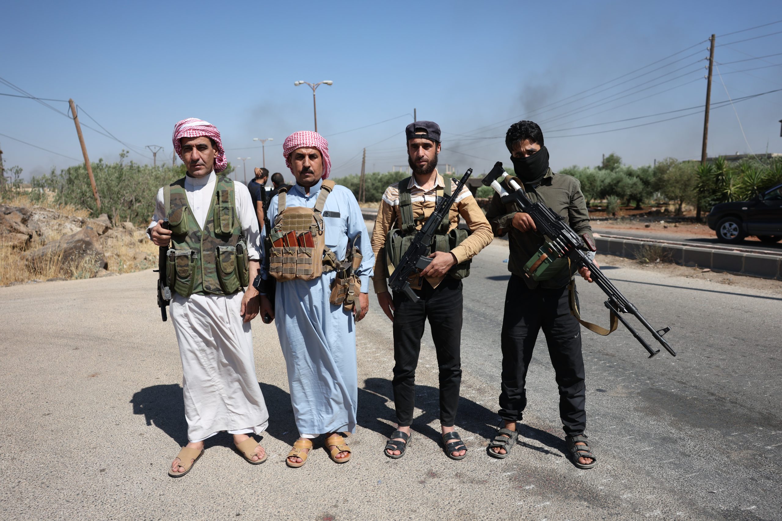 SWEIDA, SYRIA - JULY 18:  Bedouin fighters are seen on the streets of al-Mazraa village in Syria's southern Sweida governorate on July 18, 2025 in Sweida, Syria. Bedouins have travelled to Sweida from other governorates to help their brothers, as fighting flared up again between the Bedouin tribe and Druze sect in the southern Syrian province of Suwayda, as another ceasefire has collapsed a day after Syrian troops pulled out of the area. (Photo by Ali Haj Suleiman/Getty Images) Fighting has flared up again between the Bedouin tribe and Druze sect in the southern Syrian province of Suwayda, as another ceasefire has collapsed a day after Syrian troops pulled out of the area. (Photo by Ali Haj Suleiman/Getty Images)